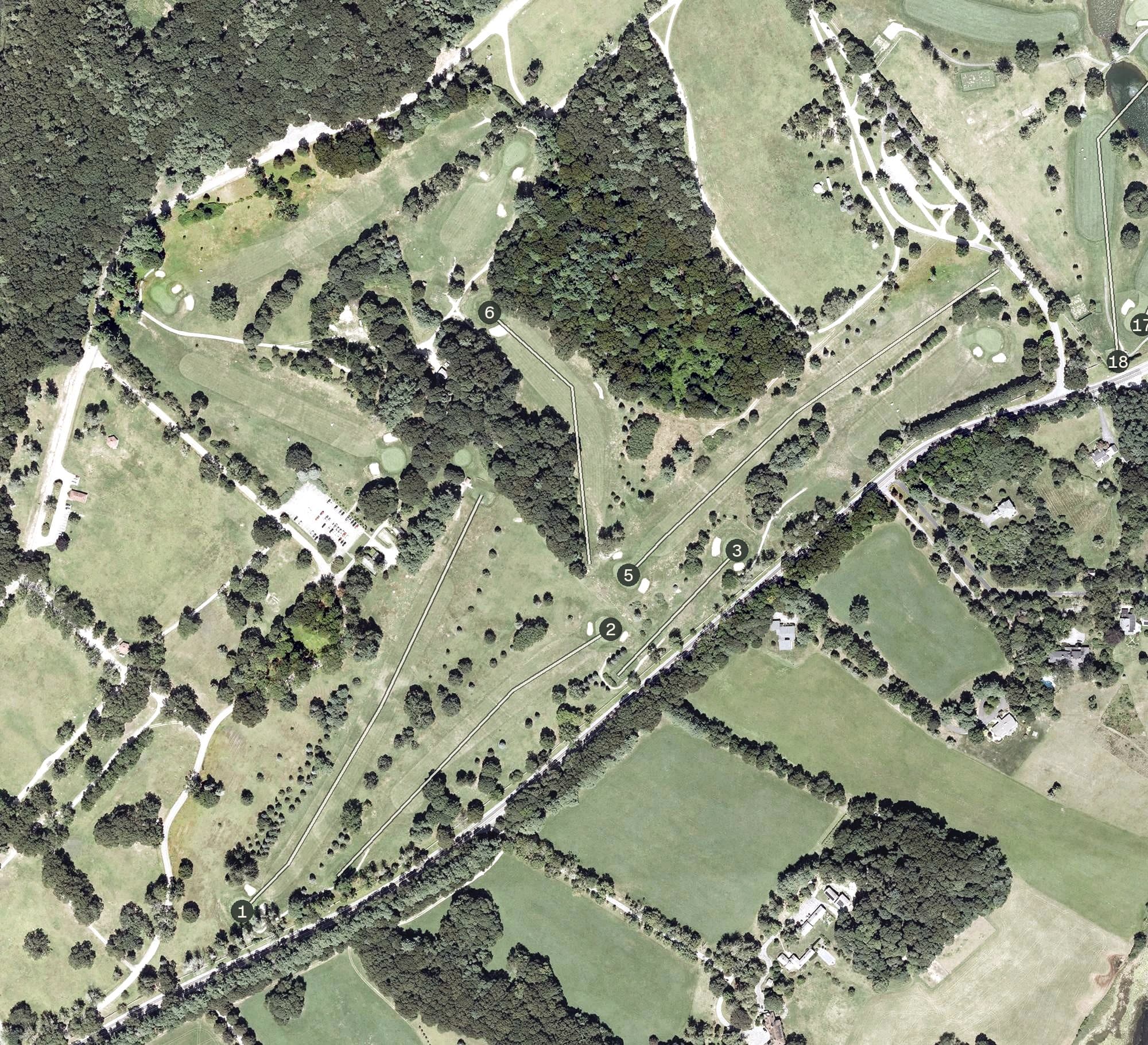 Aerial view of Goddard Memorial State Golf Course, RI, with its hole routing marked