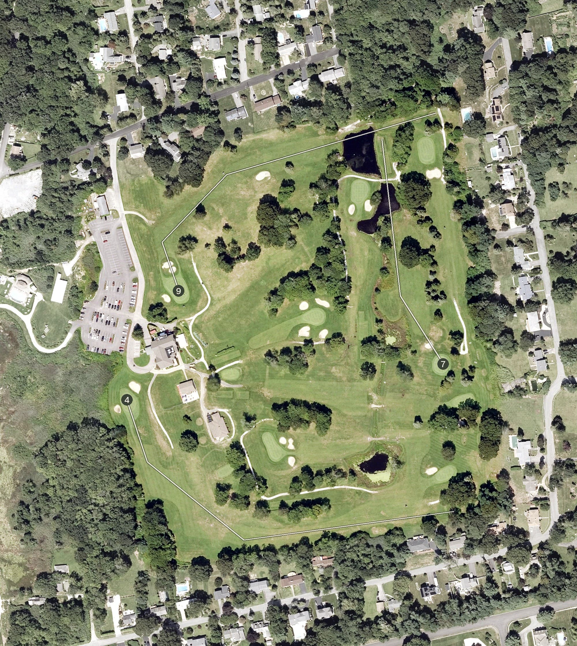 Aerial view of Harbor Lights Golf Course, RI, with its hole routing marked