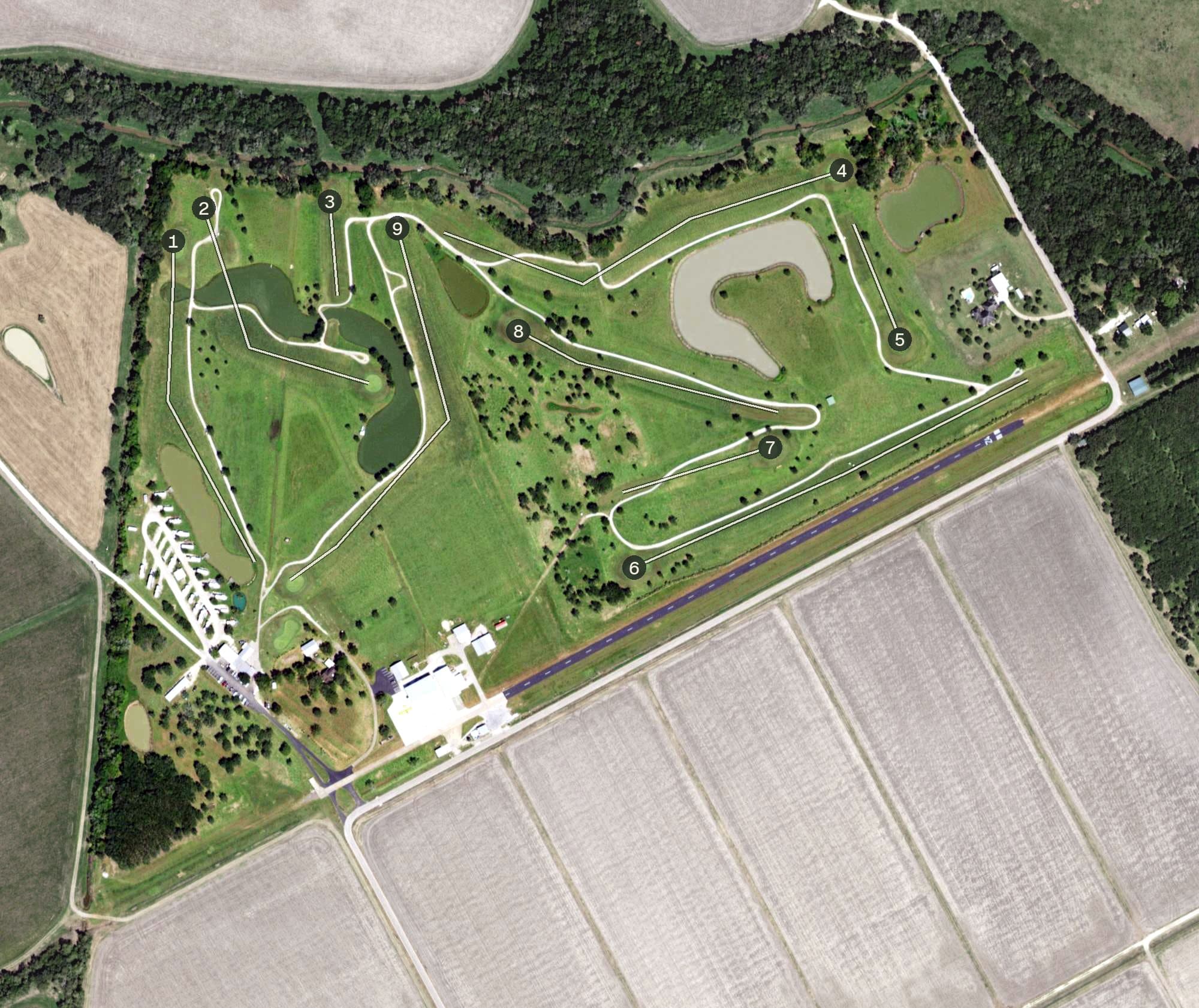 Aerial view of Austin Bayou Golf Course, TX, with its hole routing marked