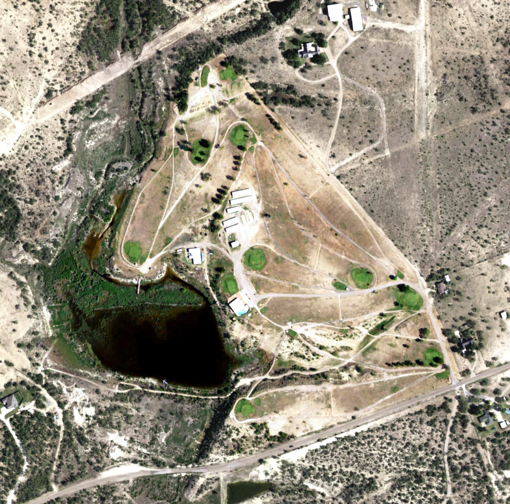Aerial view of Ballinger Country Club, TX, with its hole routing marked