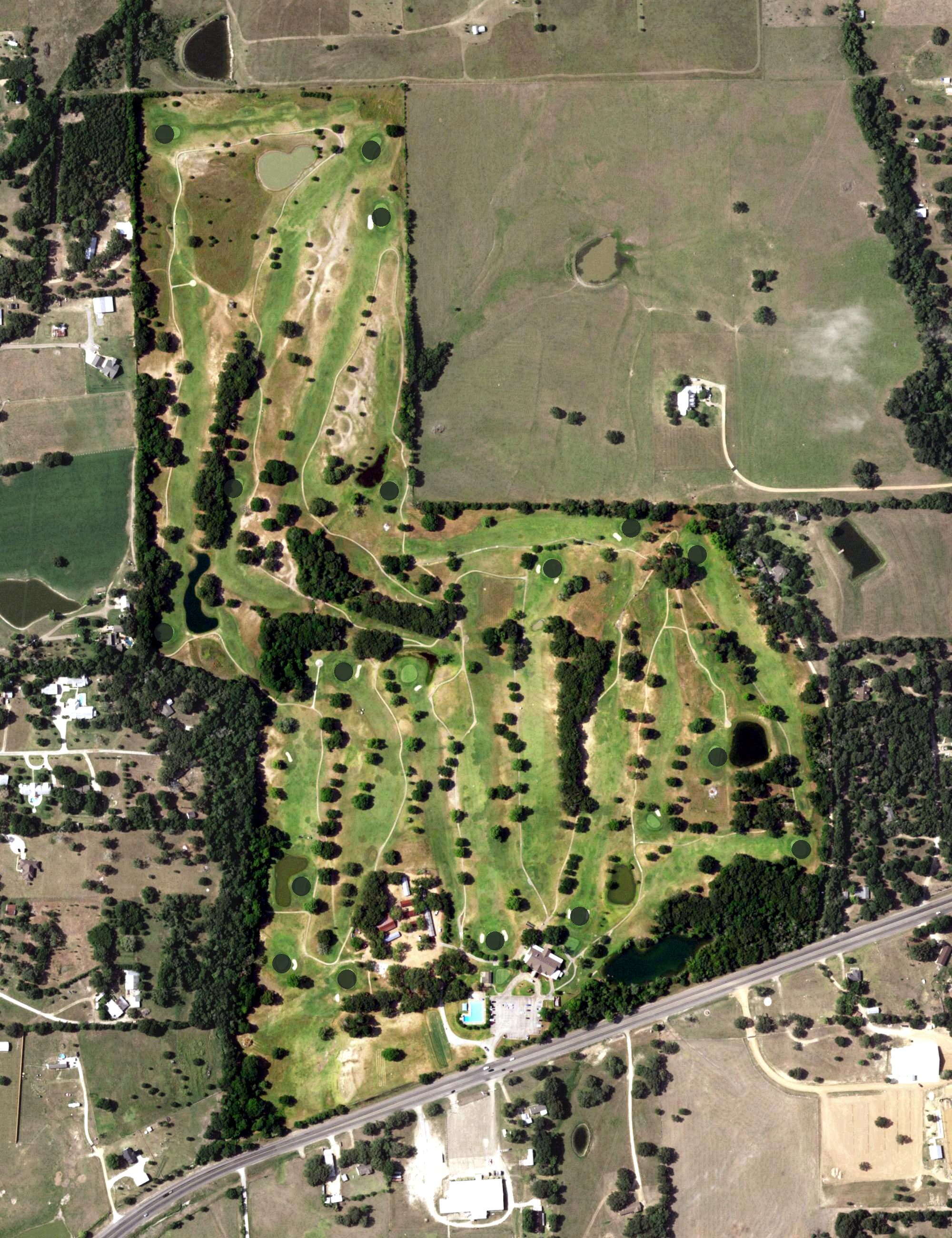 Aerial view of Brenham Country Club, TX, with its hole routing marked