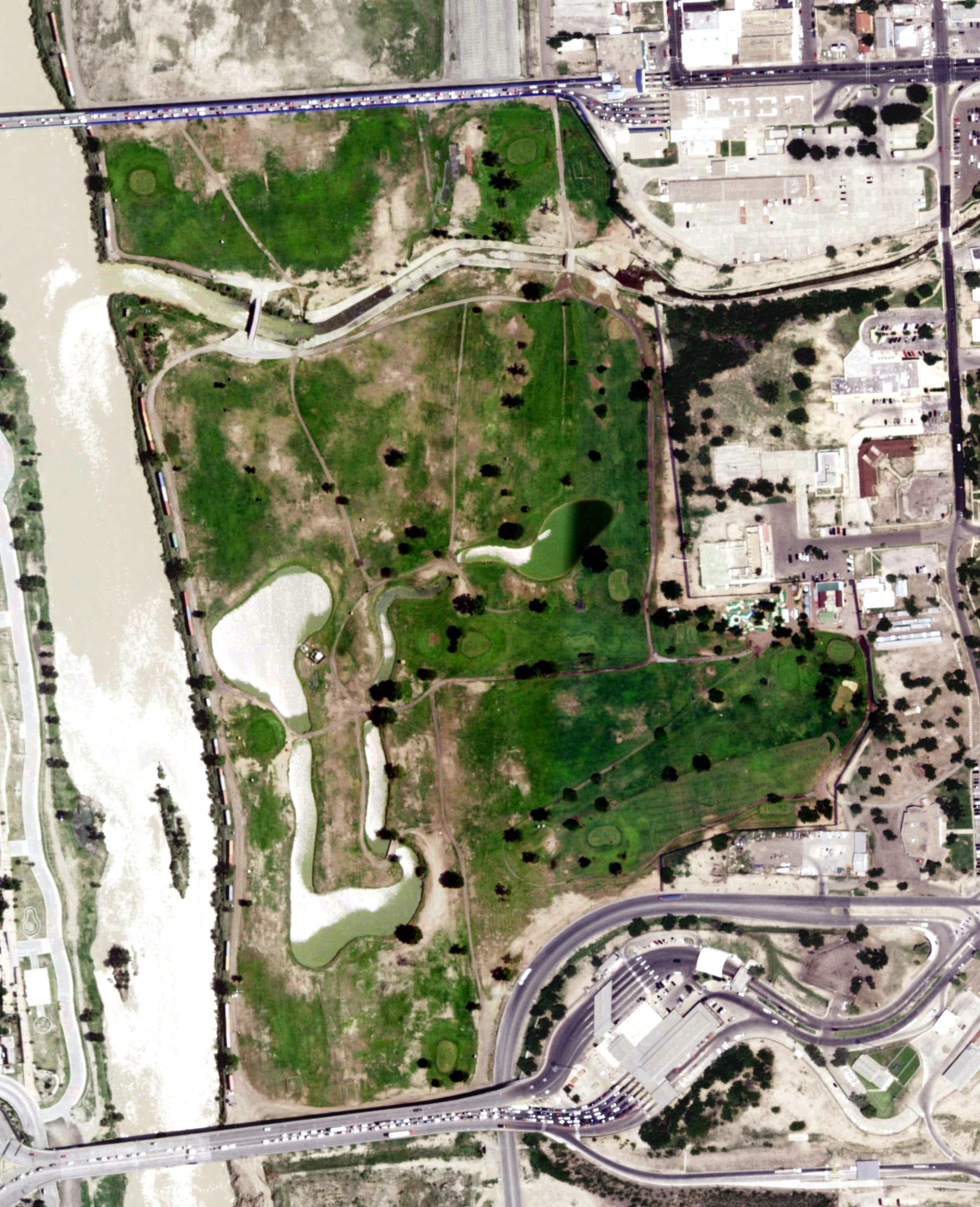 Aerial view of Eagle Pass Golf Course, TX, with its hole routing marked