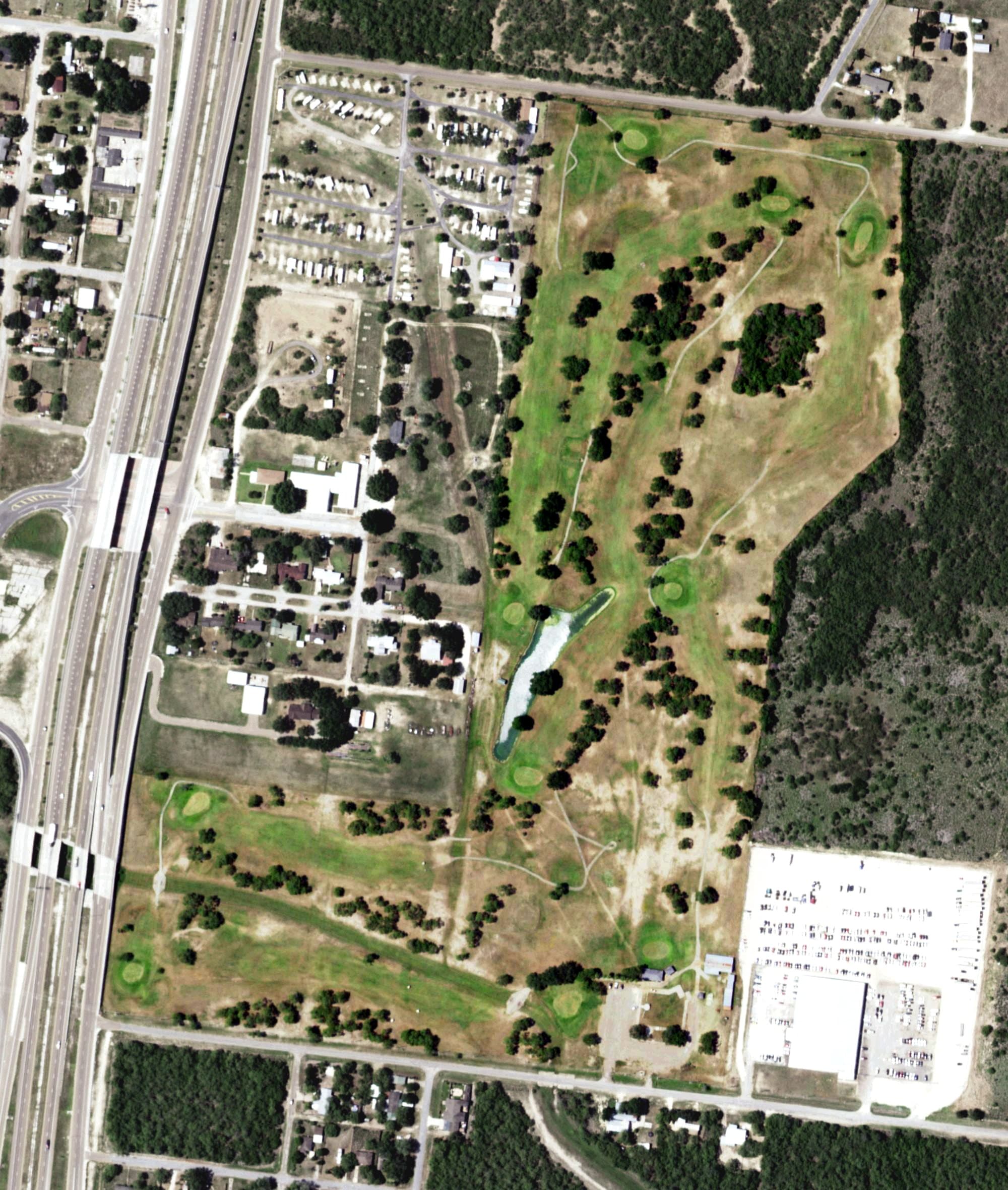 Aerial view of Ed Rachal Memorial Golf Course, TX, with its hole routing marked