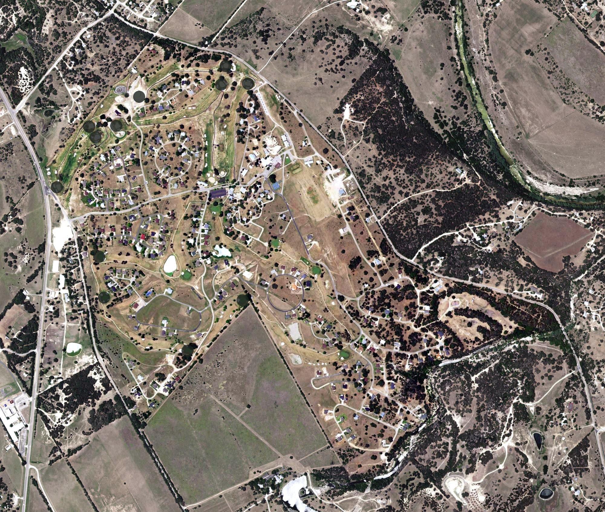 Aerial view of Flying L Golf Course and Guest Ranch, TX, with its hole routing marked