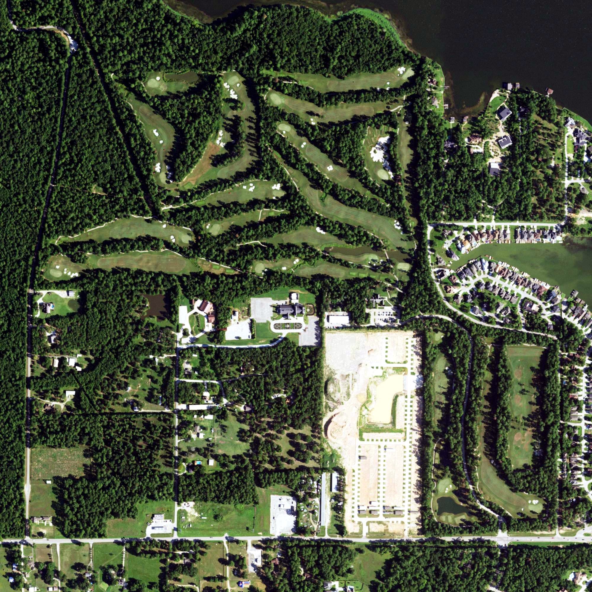 Aerial view of Grand Pines Golf Club, TX, with its hole routing marked