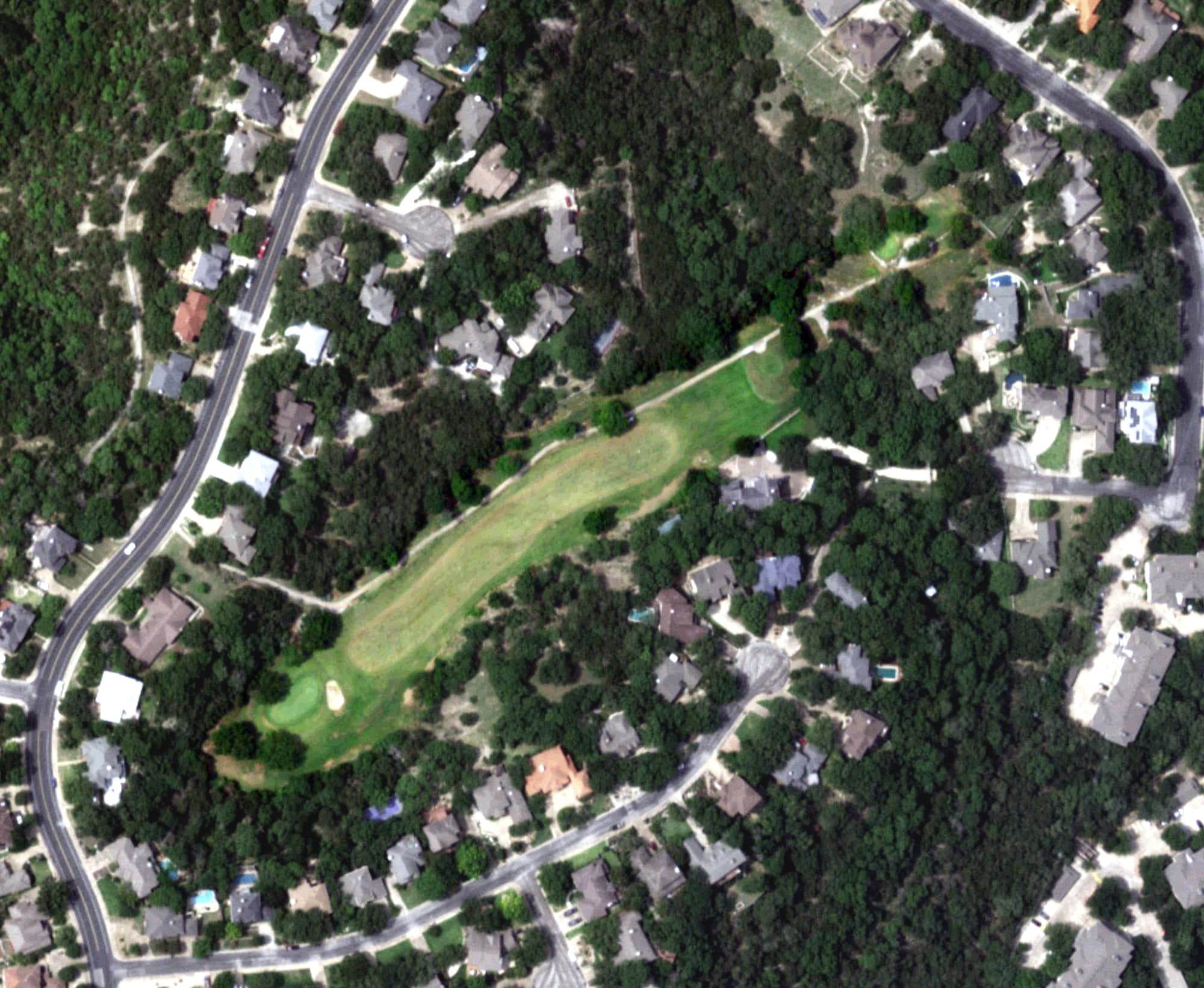 Aerial view of Great Hills Golf Club, TX, with its hole routing marked