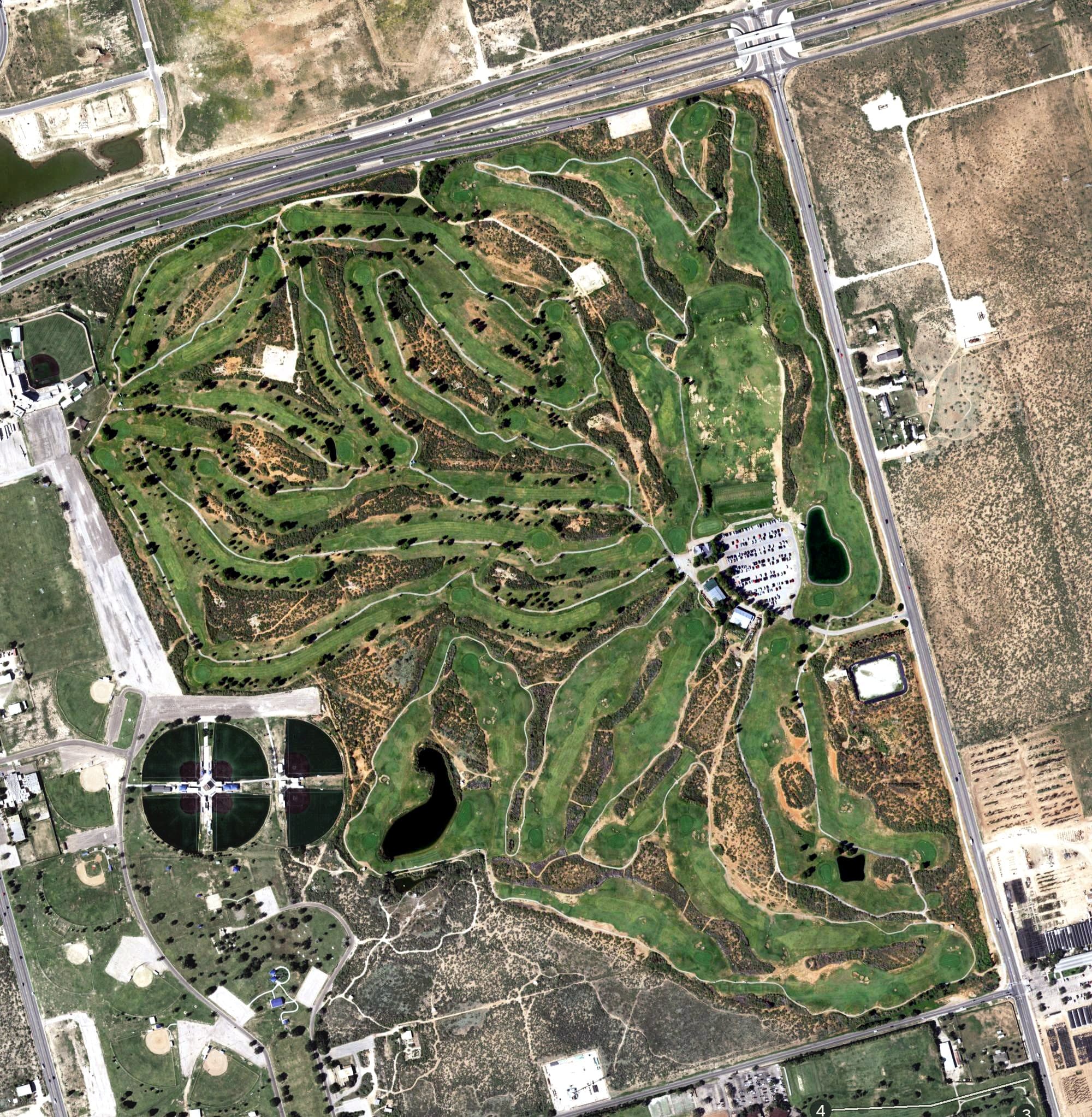 Aerial view of Hogan Golf Course, TX, with its hole routing marked