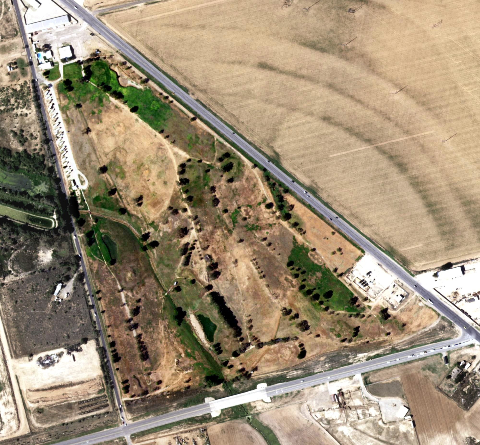 Aerial view of Lamesa Country Club, TX, with its hole routing marked