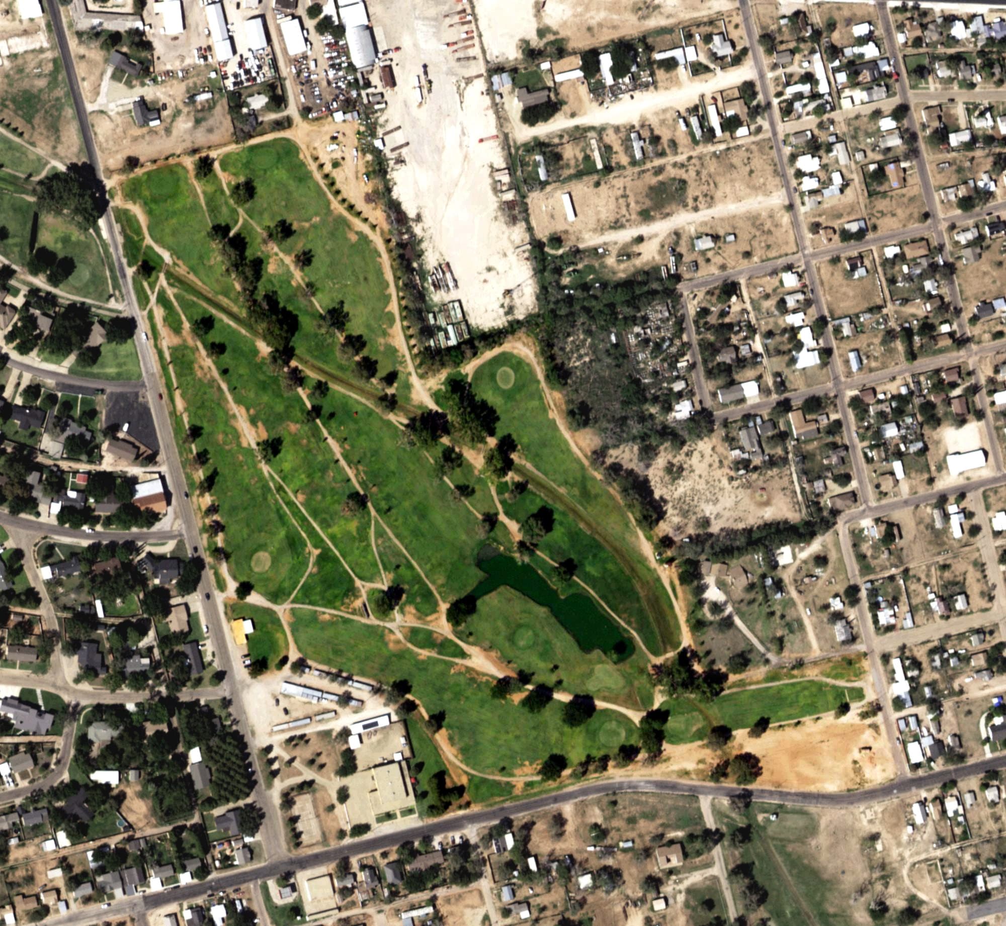 Aerial view of Lamesa Municipal Golf Course, TX, with its hole routing marked