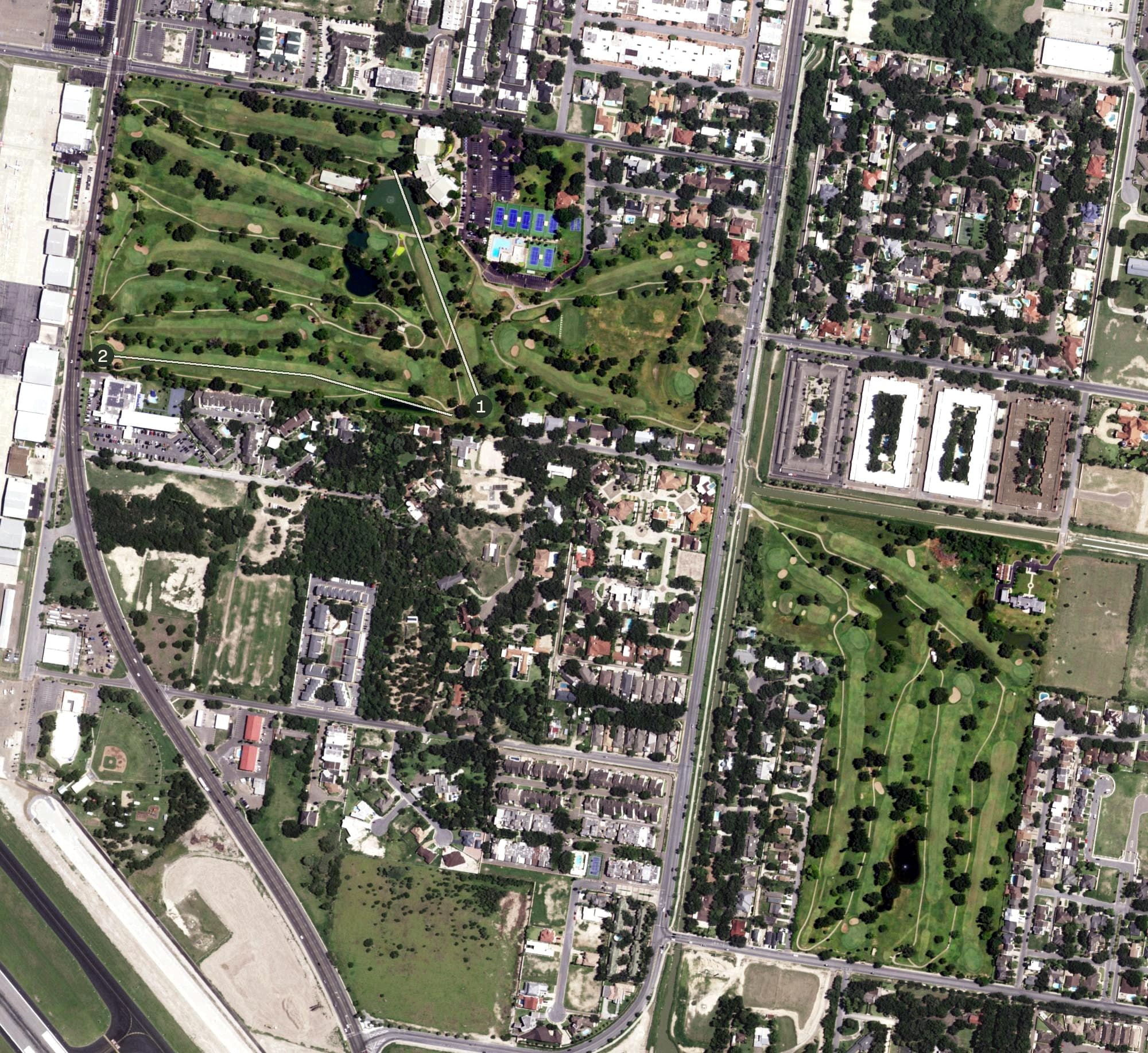 Aerial view of McAllen Country Club, TX, with its hole routing marked