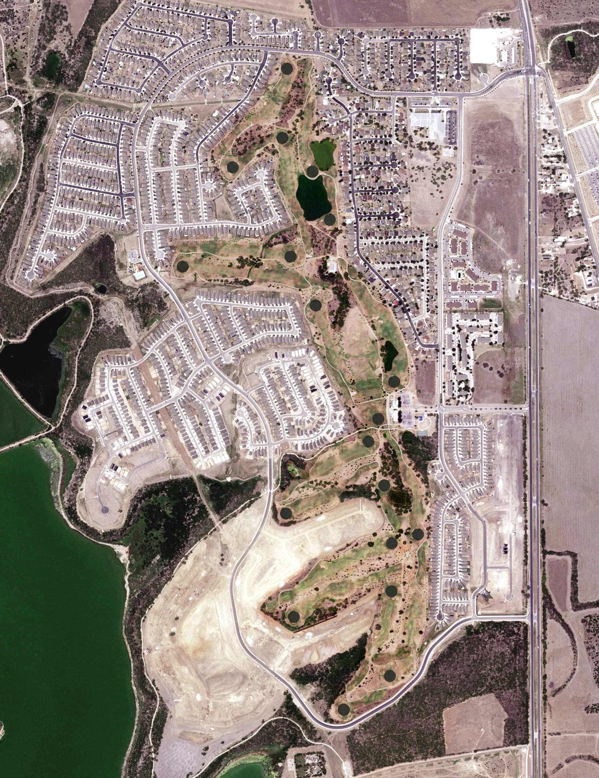 Aerial view of Mission Del Lago Golf Course, TX, with its hole routing marked