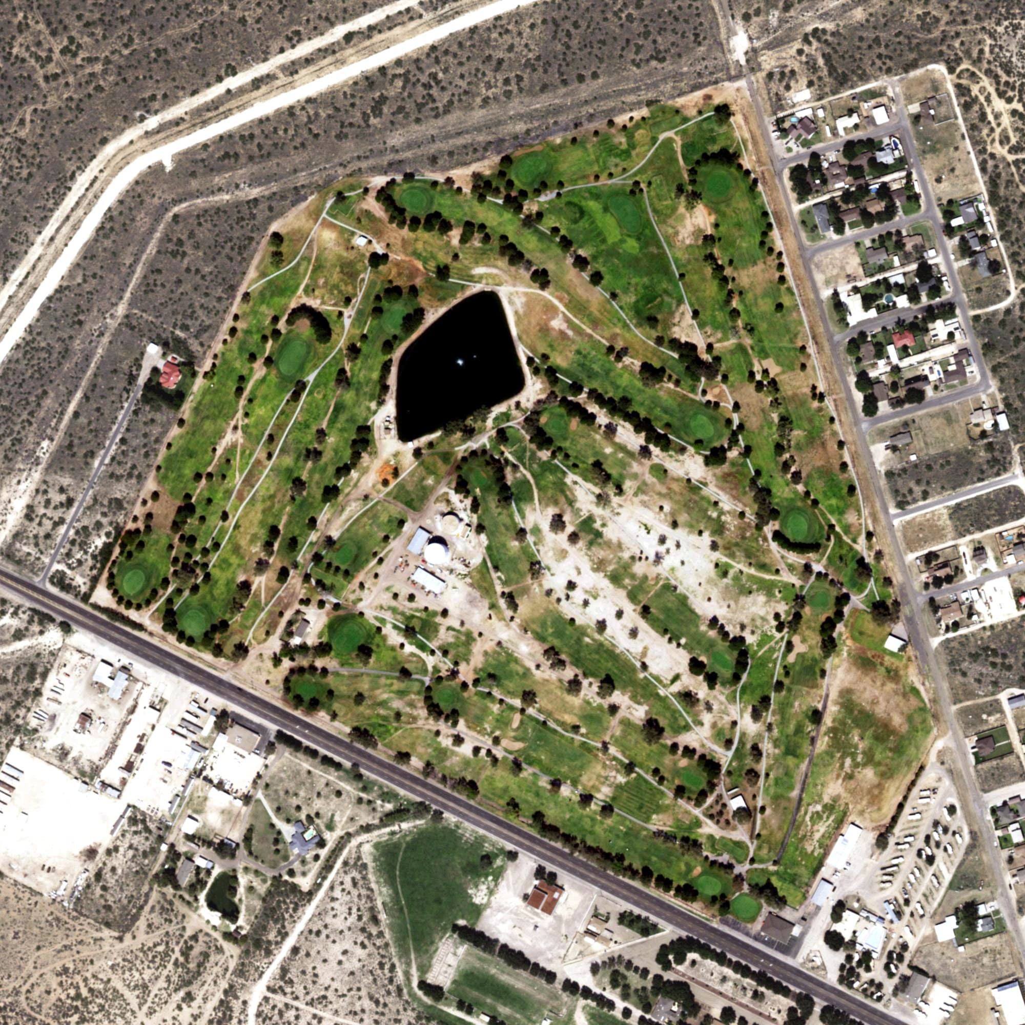 Aerial view of Monahans Country Club, TX, with its hole routing marked