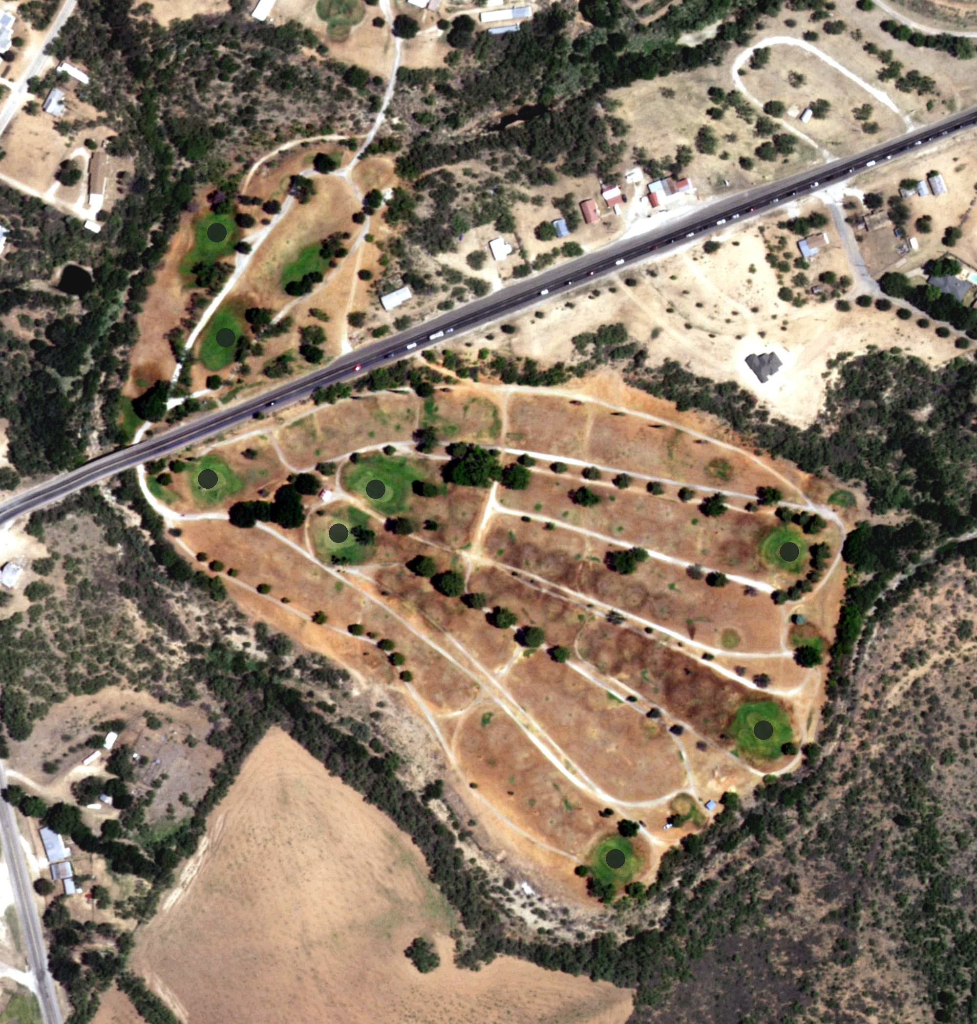 Aerial view of Mountain Creek Golf Club, TX, with its hole routing marked