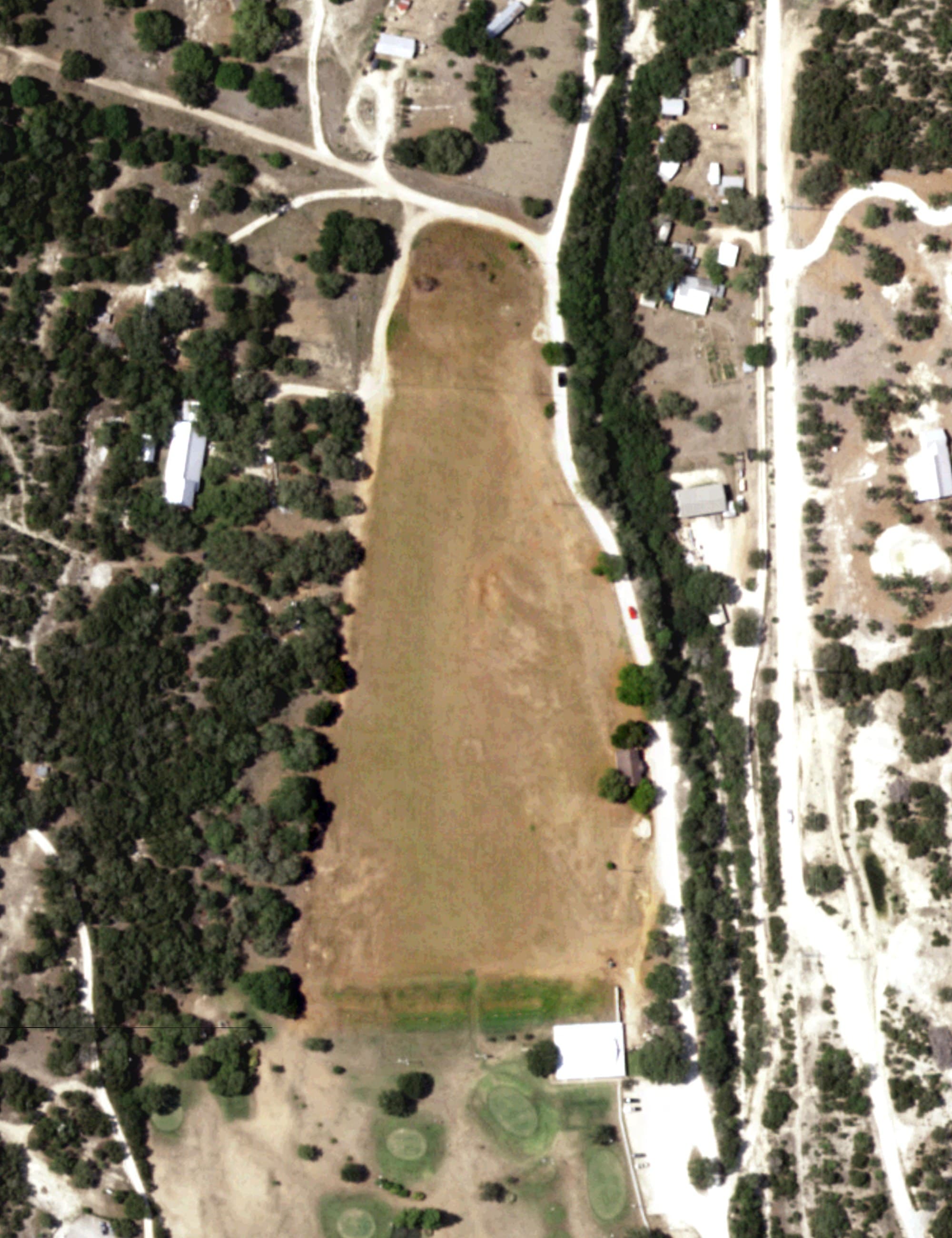 Aerial view of Oak Valley Driving Range, TX, with its hole routing marked
