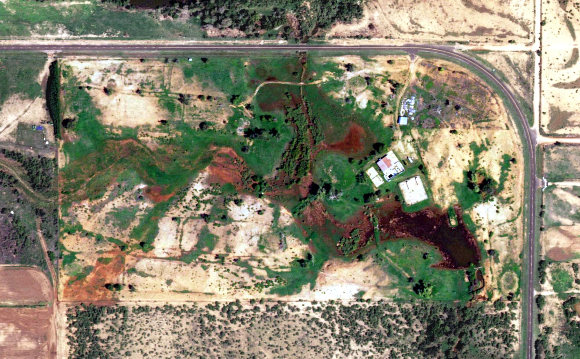 Aerial view of Paducah Golf Club, TX, with its hole routing marked