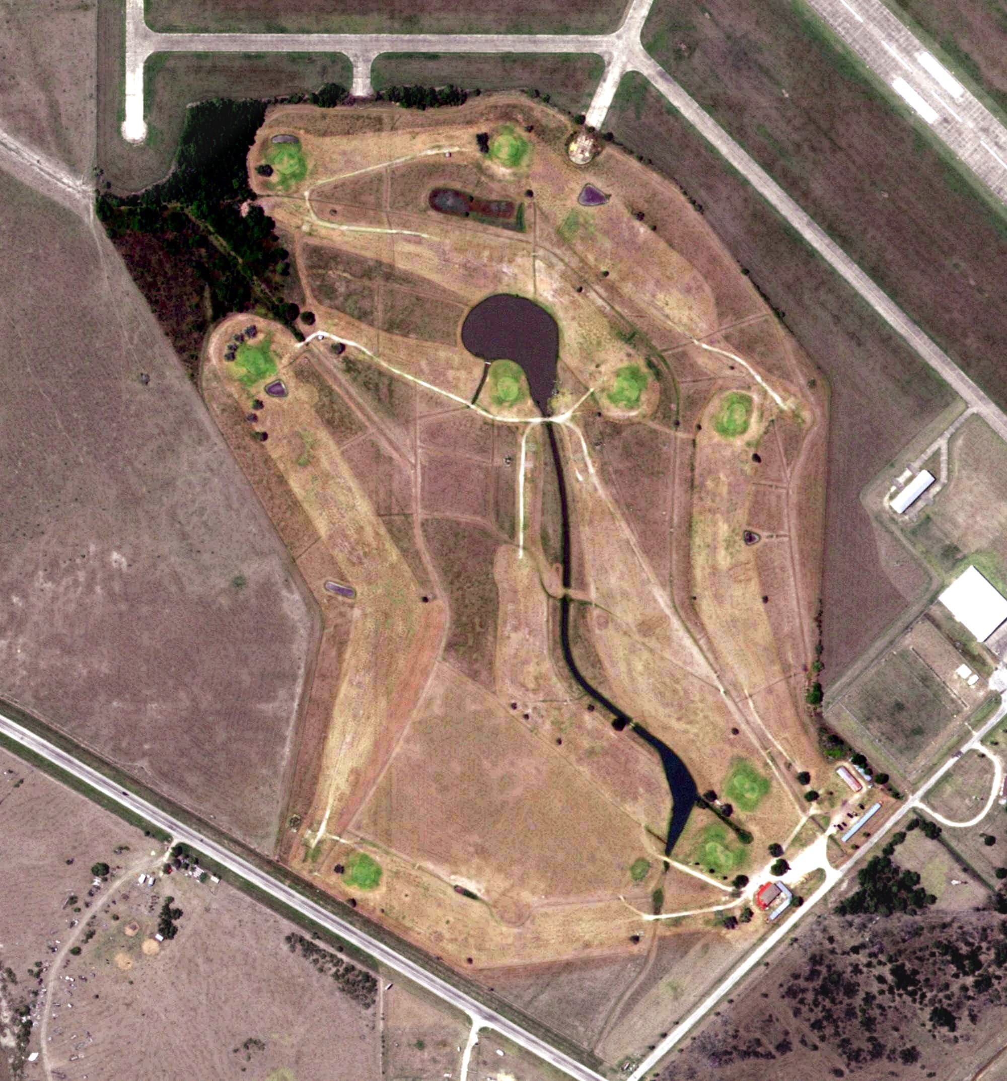 Aerial view of Palacios Golf Course, TX, with its hole routing marked
