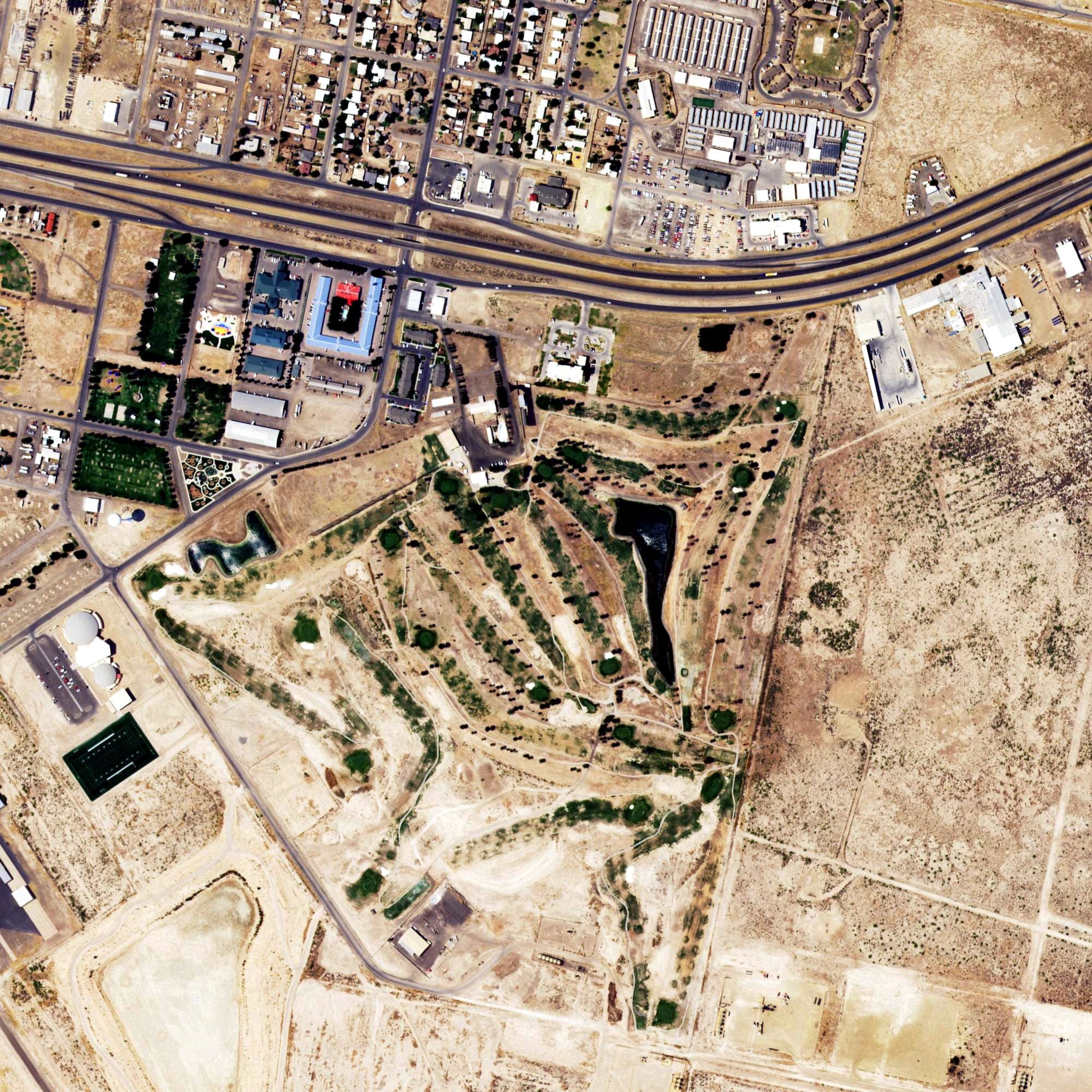 Aerial view of Pecos Golf Course, TX, with its hole routing marked