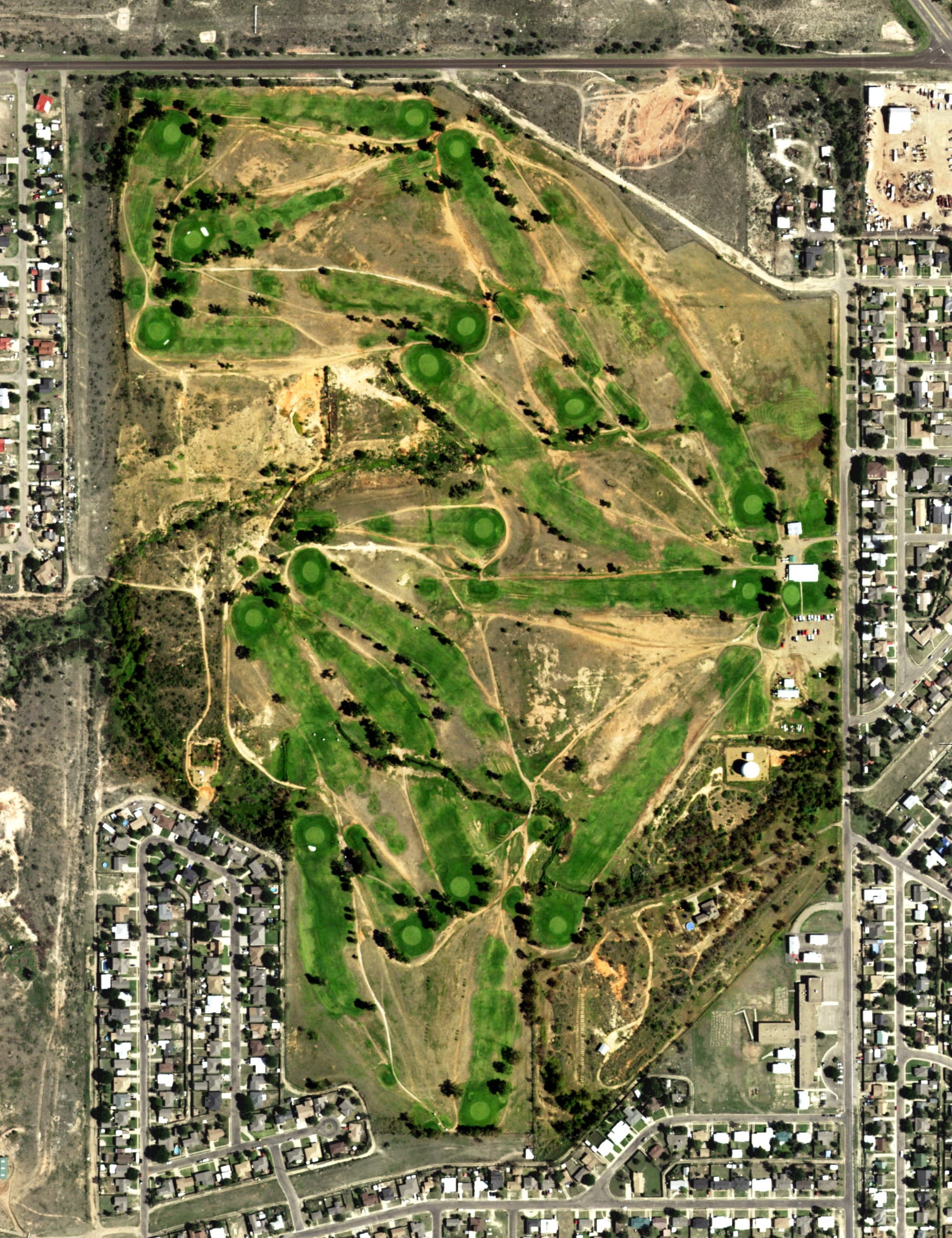 Aerial view of Phillips Municipal Course, TX, with its hole routing marked