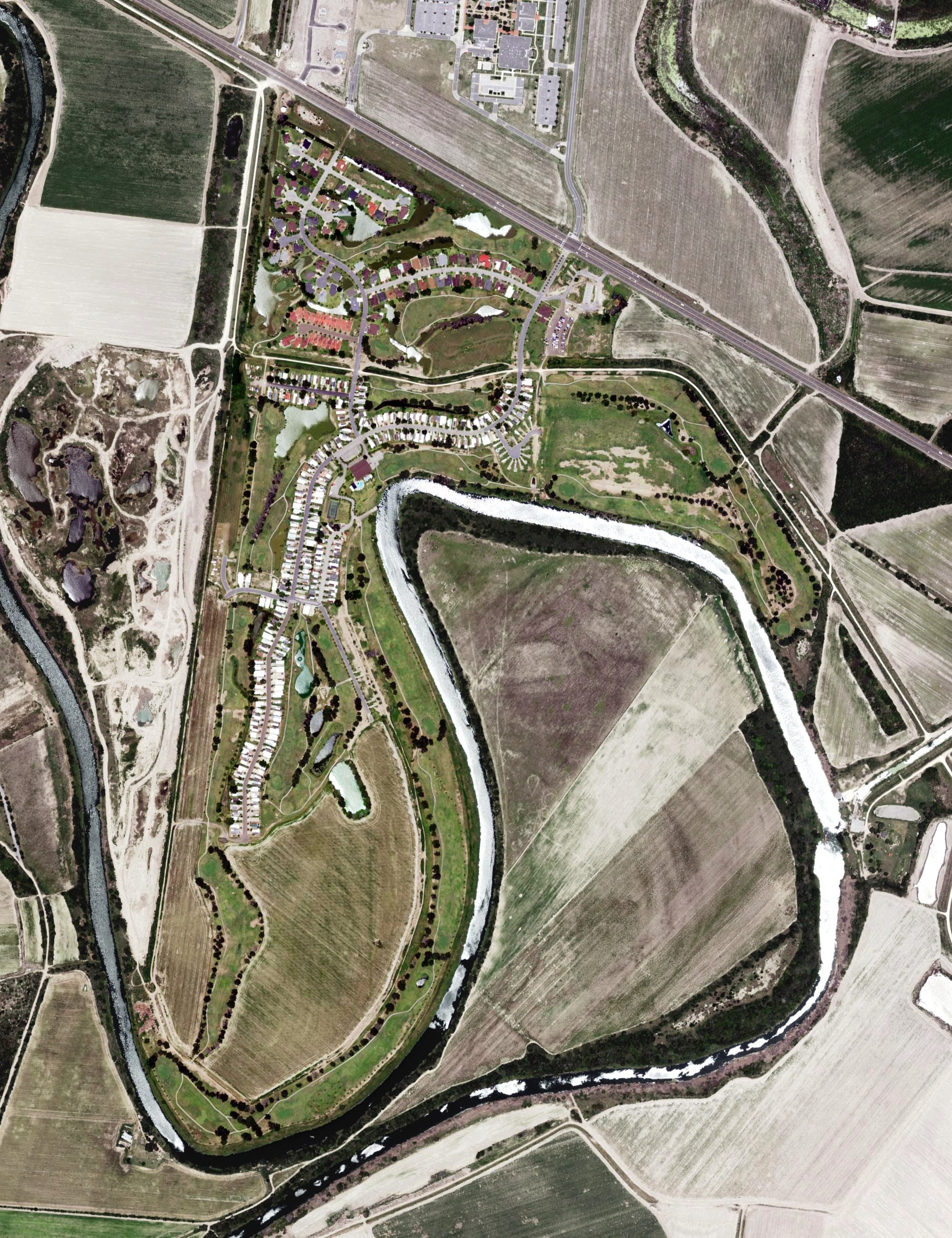 Aerial view of River Bend Country Club, TX, with its hole routing marked