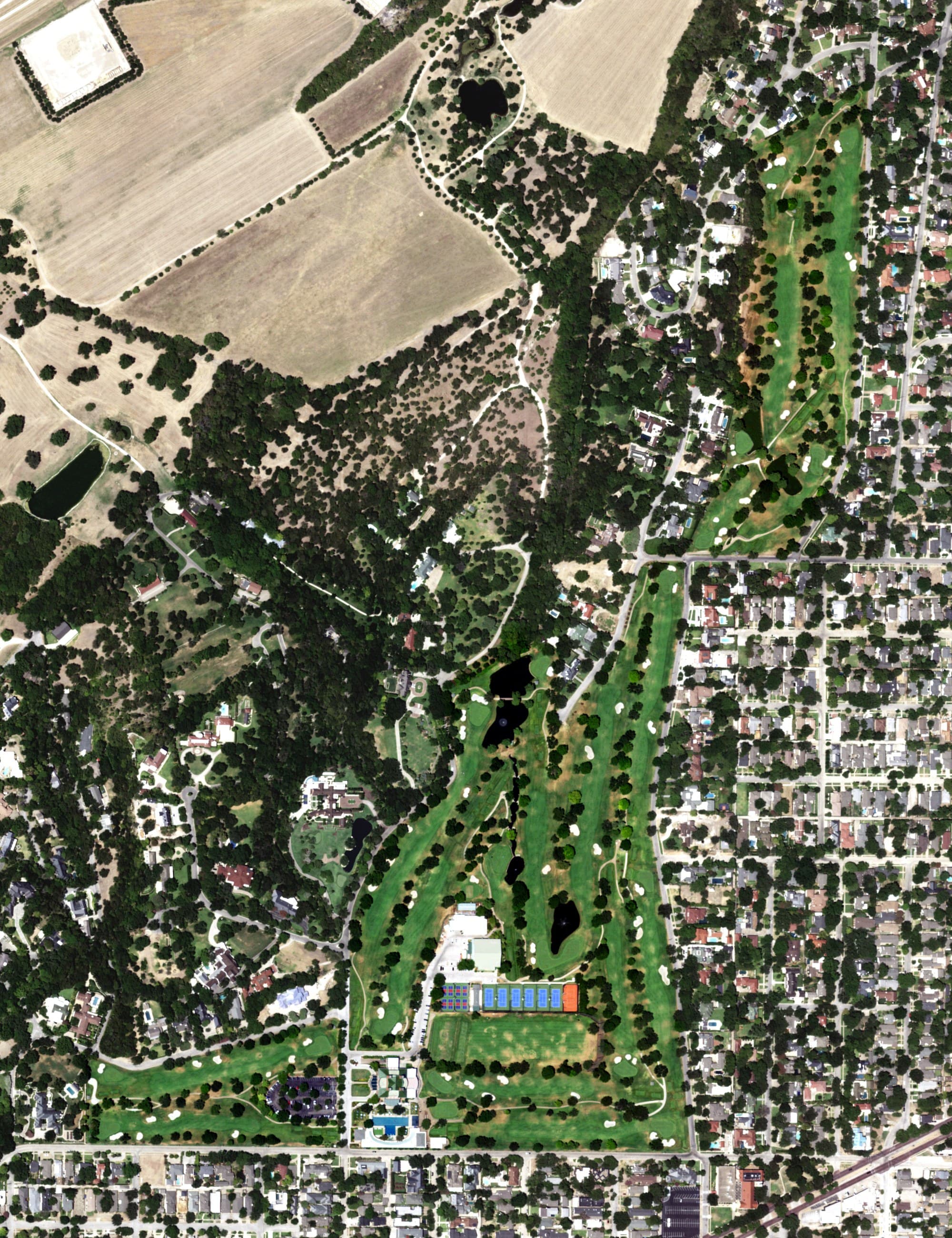 Aerial view of River Crest Country Club, TX, with its hole routing marked