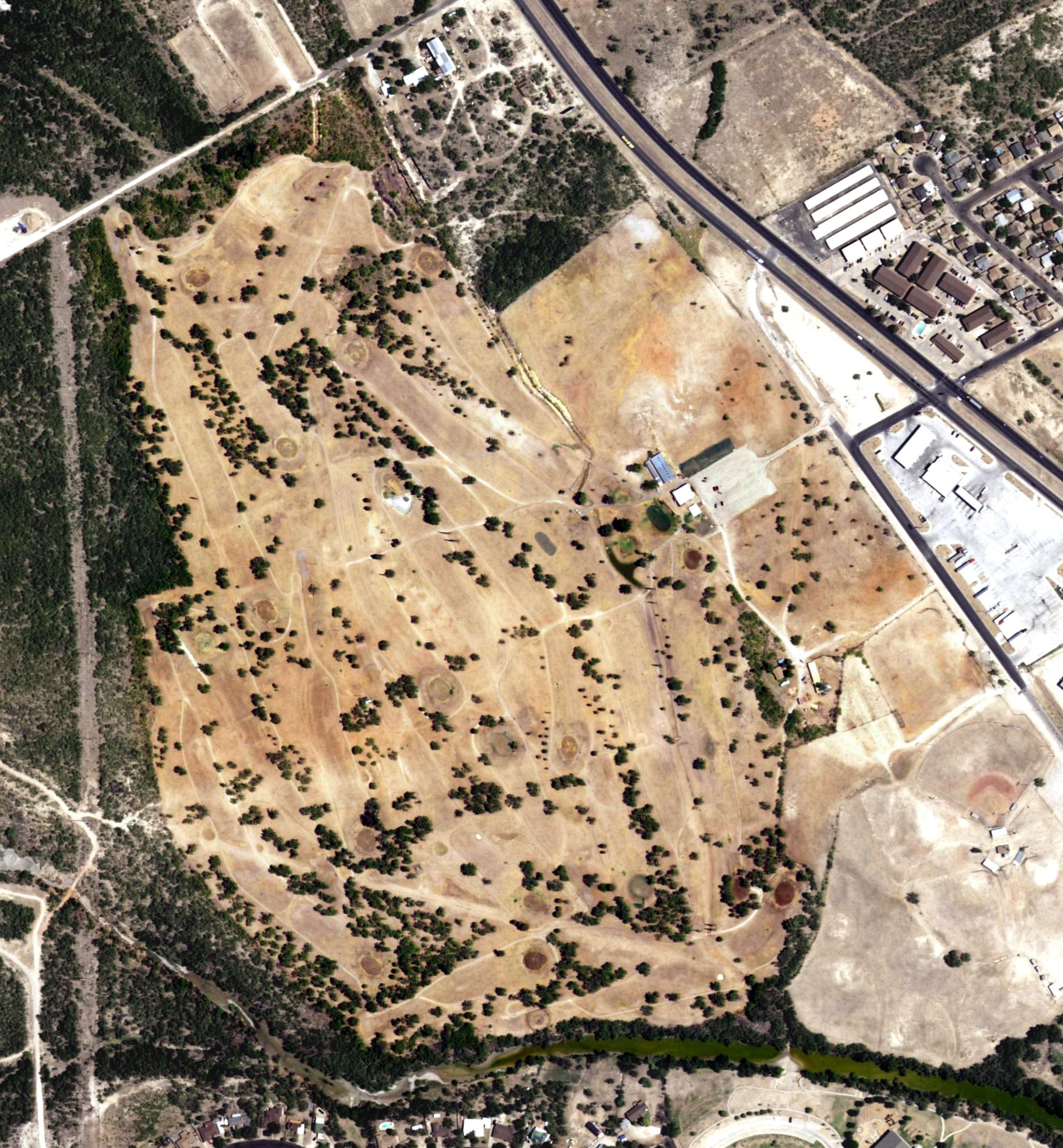 Aerial view of Riverside Hills Golf Club, TX, with its hole routing marked