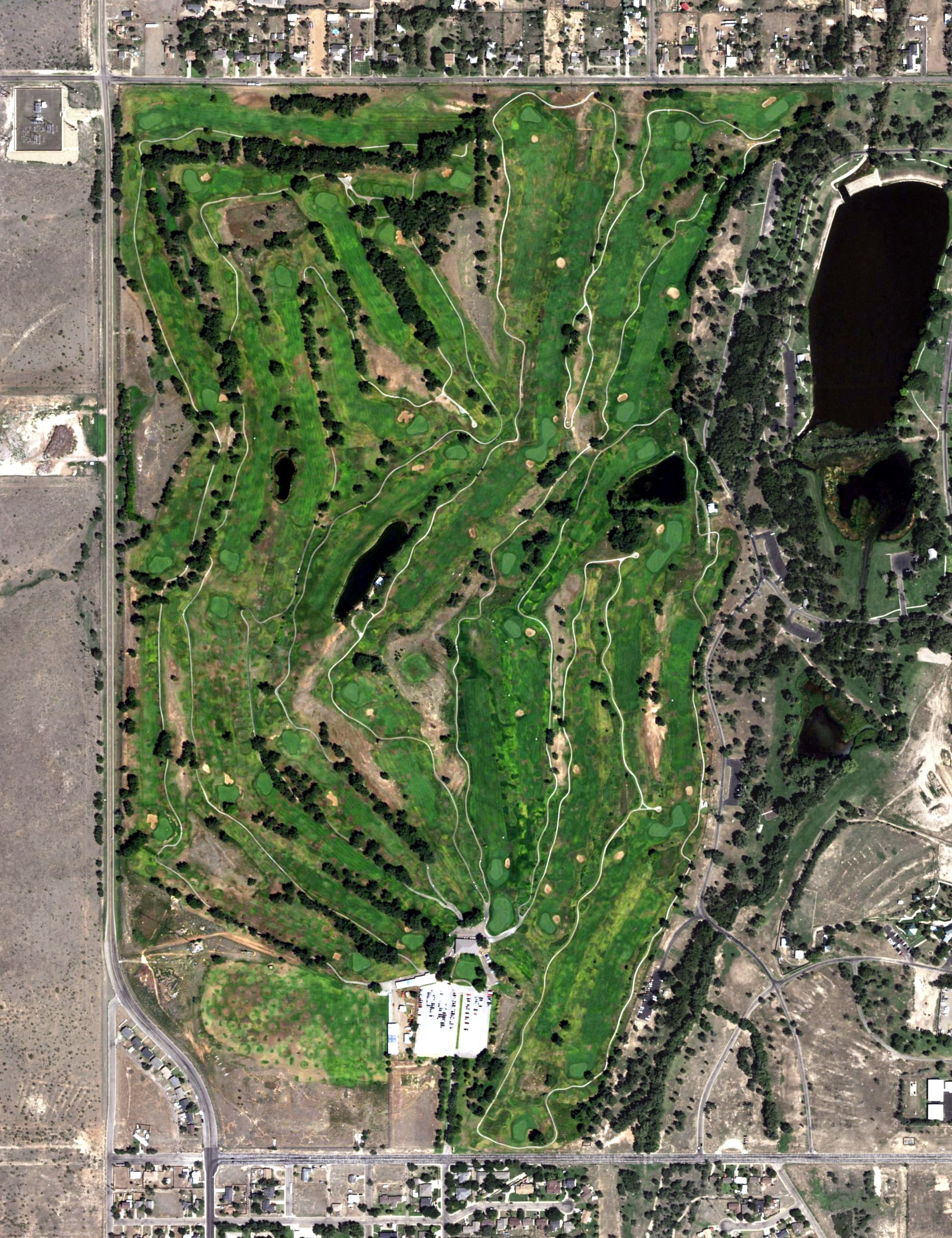 Aerial view of Ross Rogers Public Golf Course, TX, with its hole routing marked