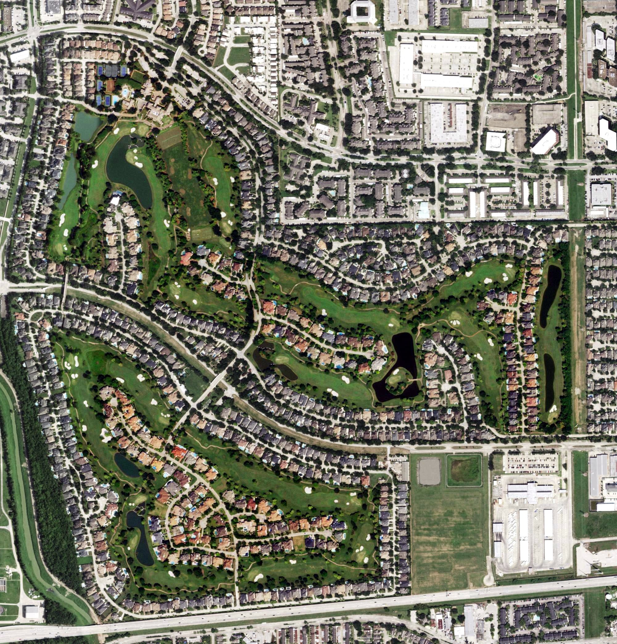 Aerial view of Royal Oaks Country Club, TX, with its hole routing marked
