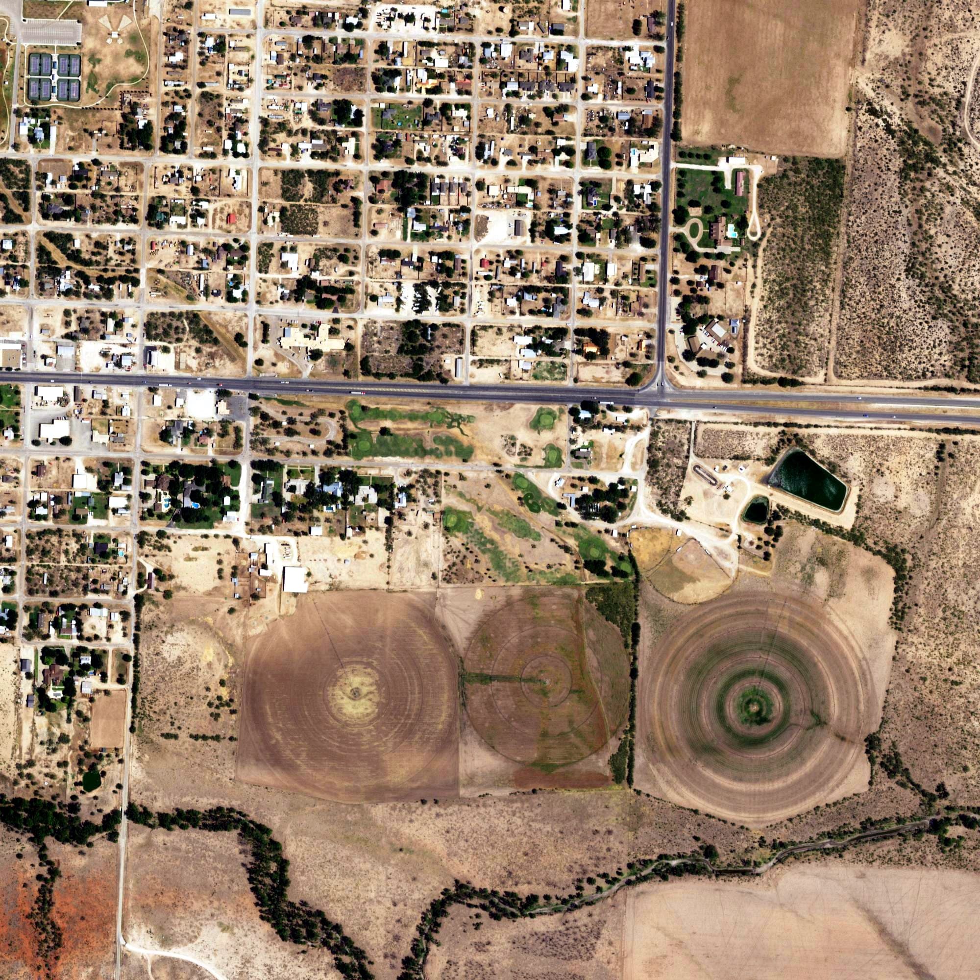 Aerial view of Sterling City Golf Course, TX, with its hole routing marked