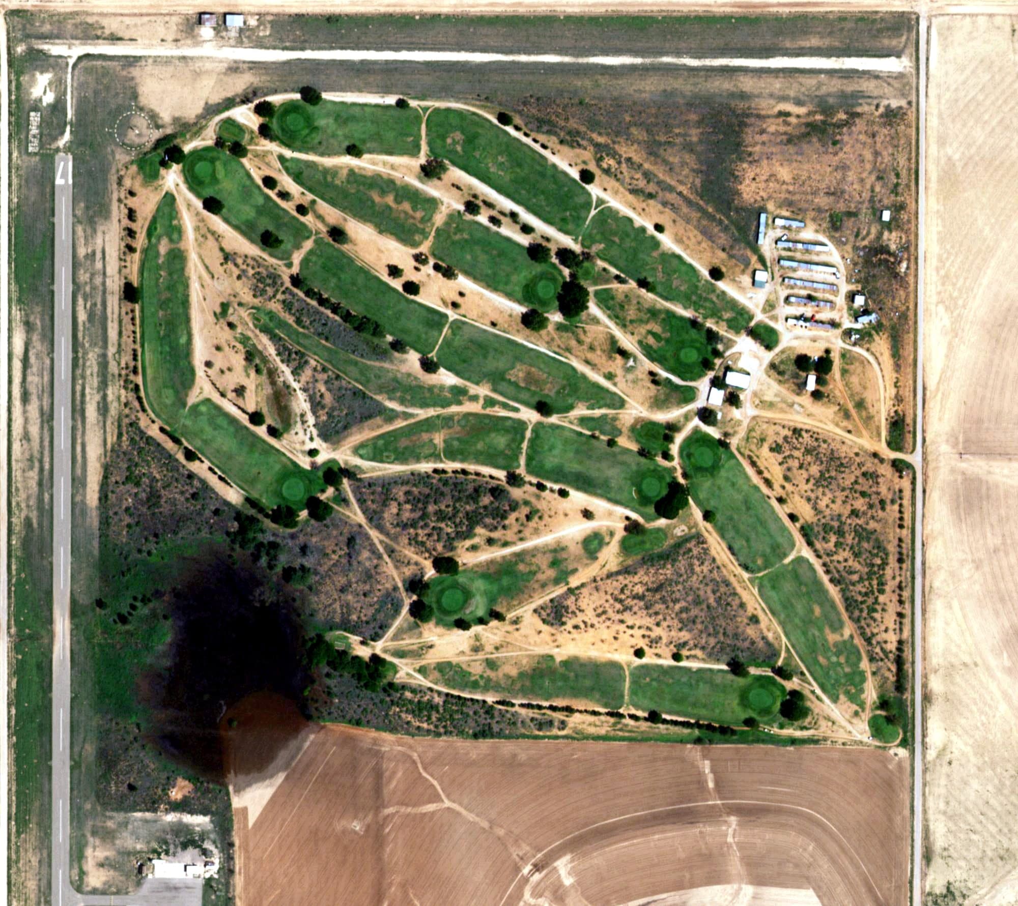 Aerial view of T-Bar Country Club, TX, with its hole routing marked