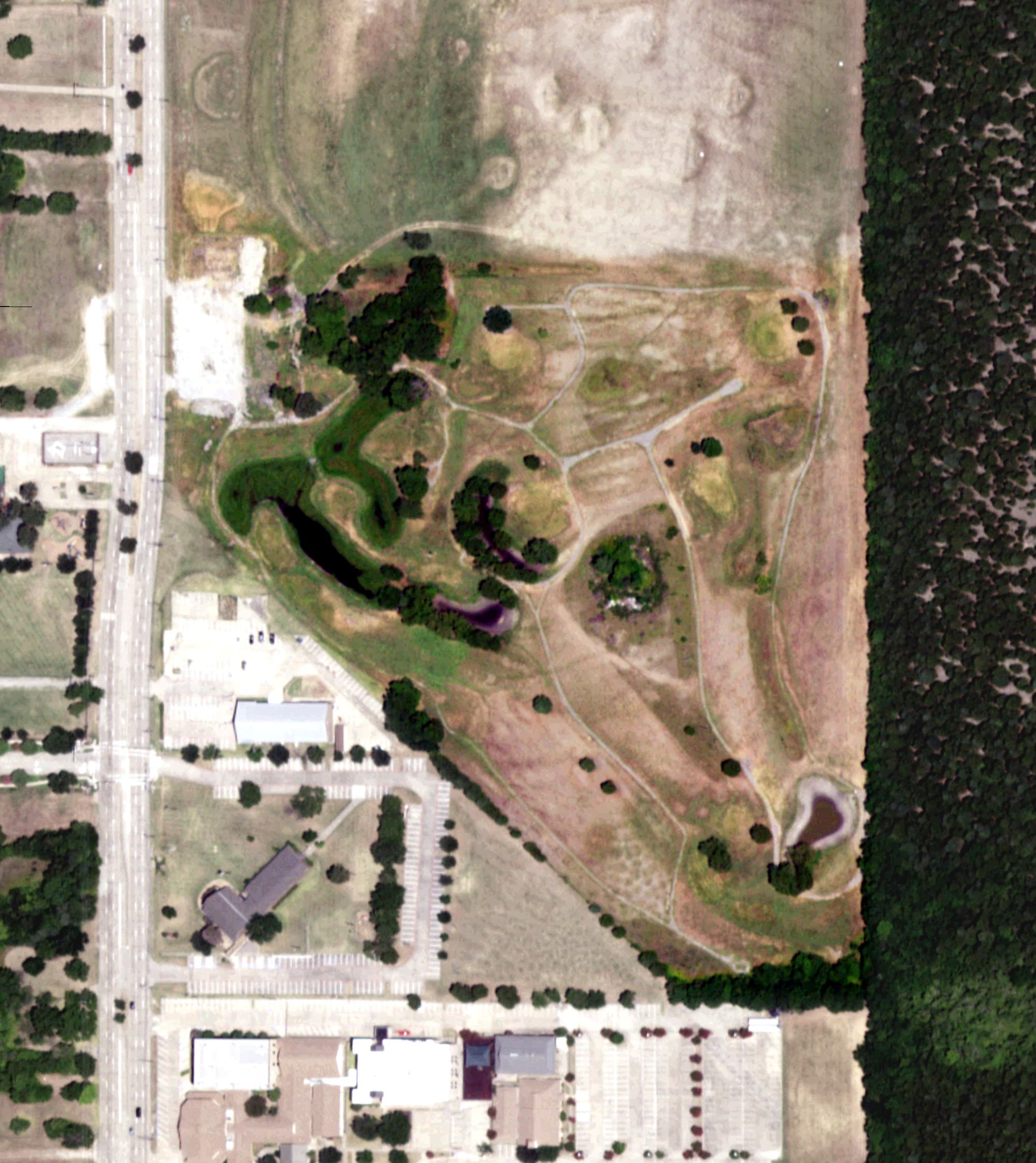 Aerial view of Tin Can Golf Instruction, TX, with its hole routing marked