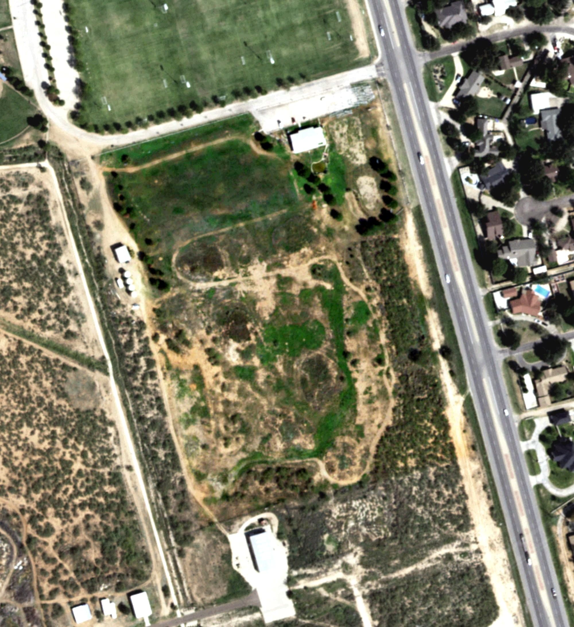 Aerial view of UTPB Golf Center, TX, with its hole routing marked