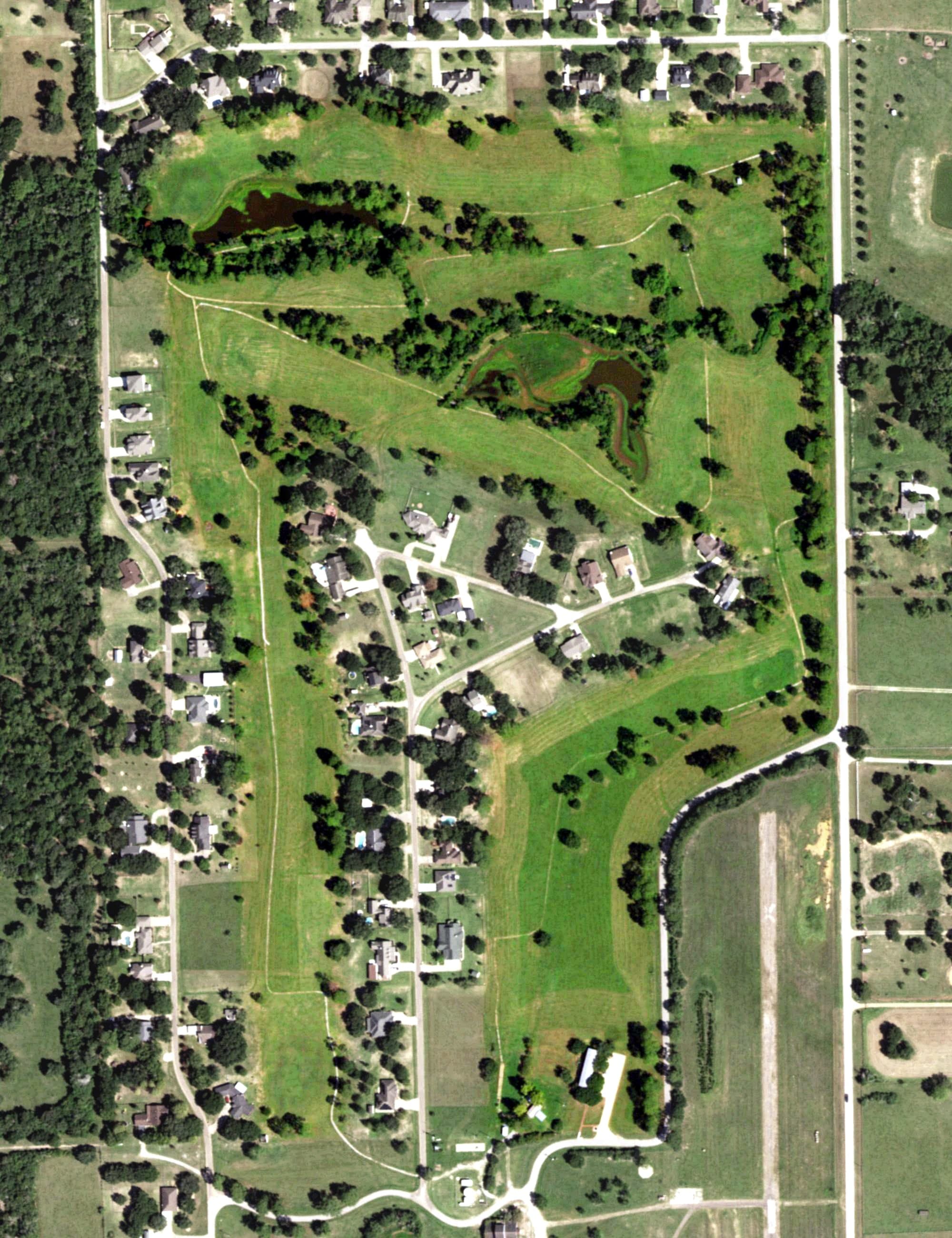 Aerial view of Waller Country Club, TX, with its hole routing marked