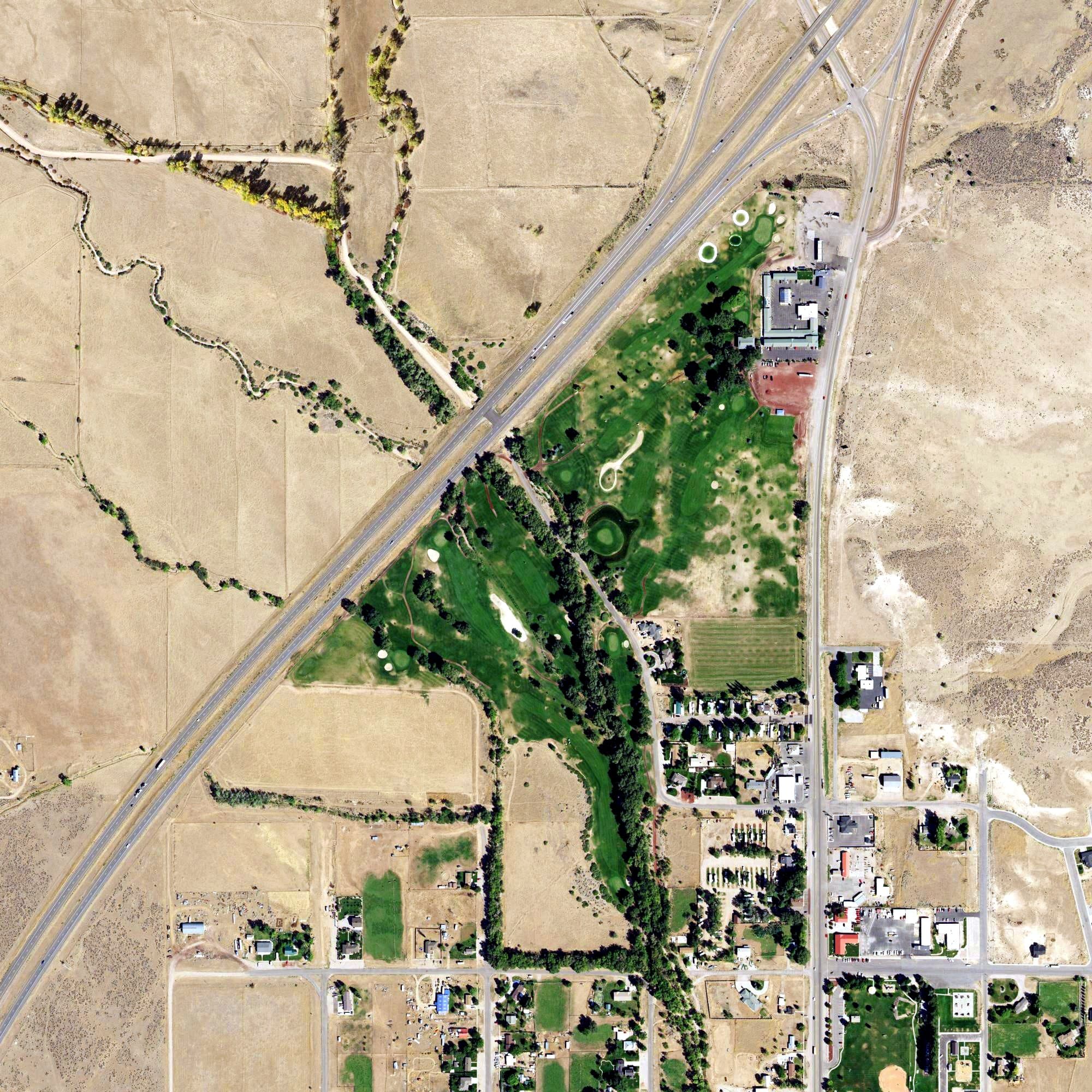 Aerial view of Paradise Golf Resort, UT, with its hole routing marked
