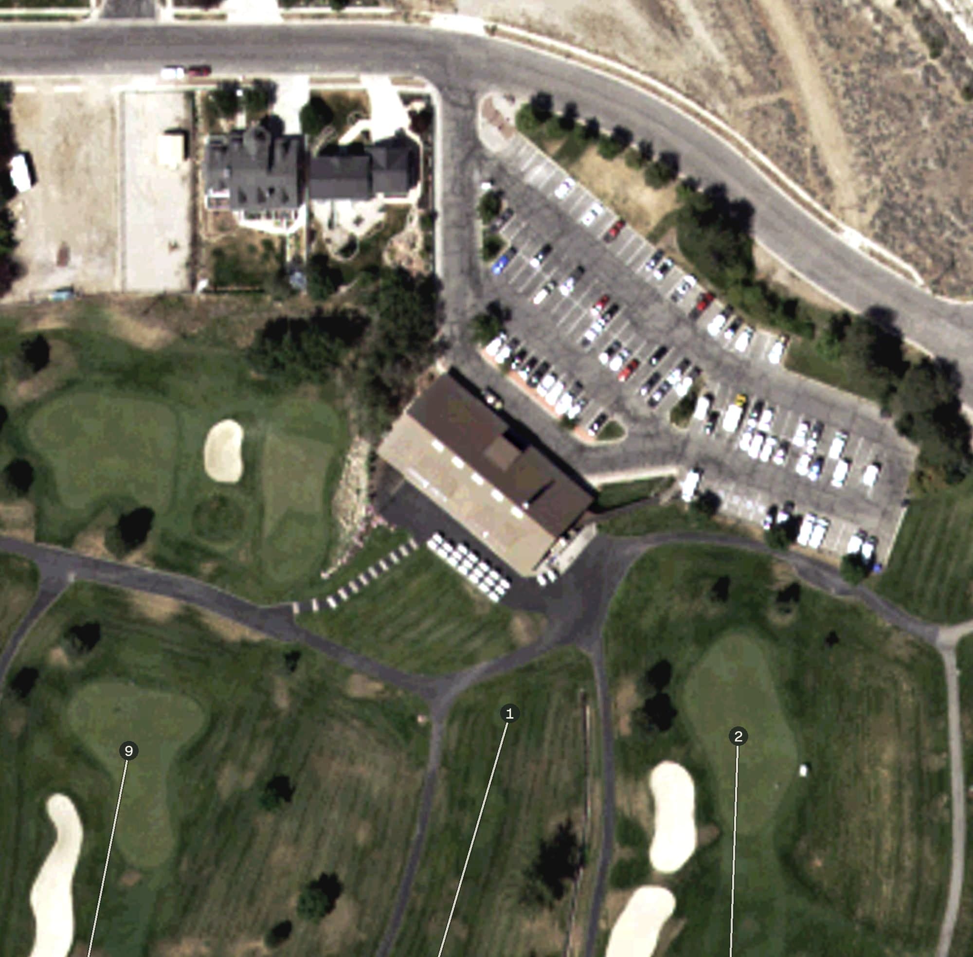 Aerial view of Pro Shop at Eagle Mountain Golf Course, UT, with its hole routing marked