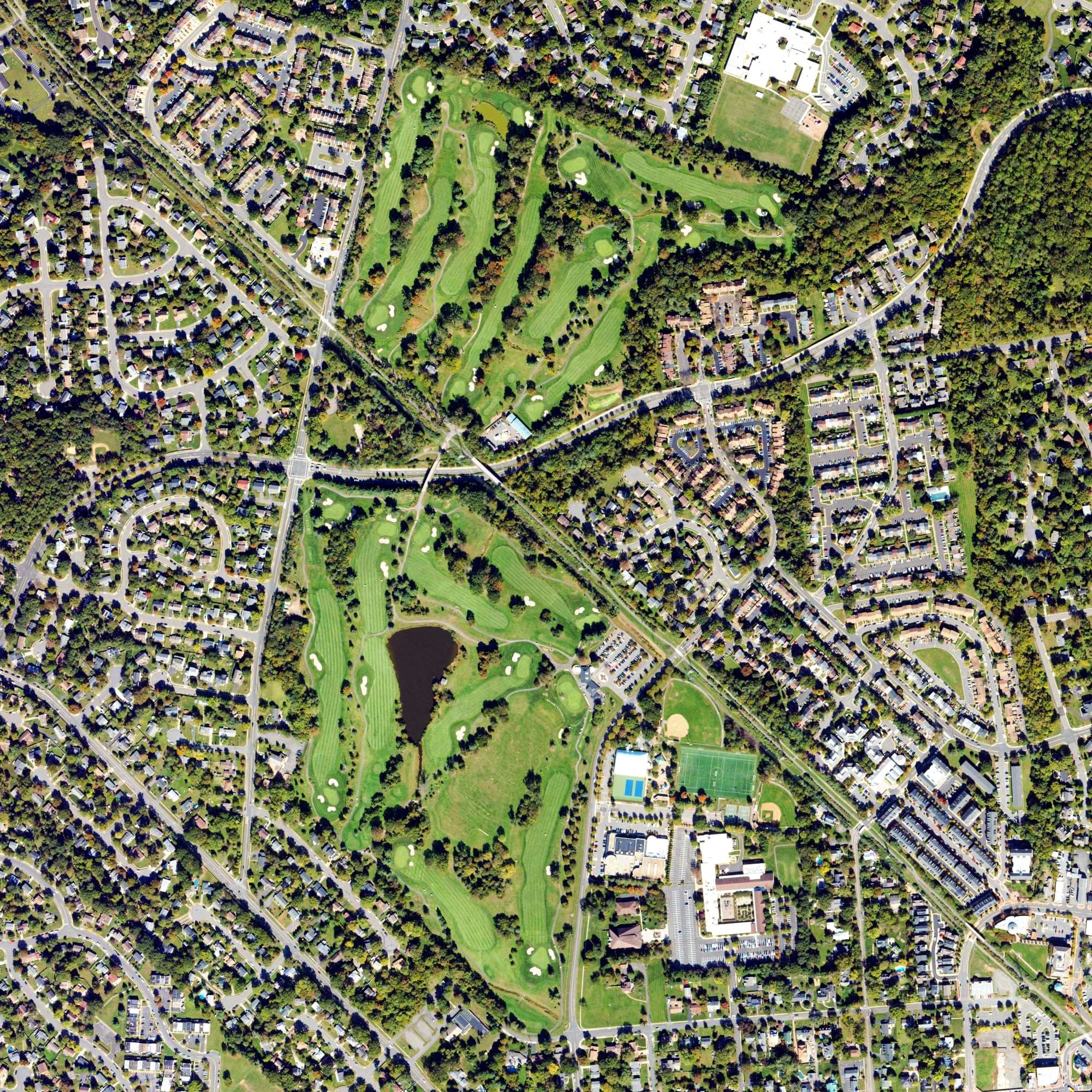 Aerial view of Herndon Centennial Golf Course, VA, with its hole routing marked