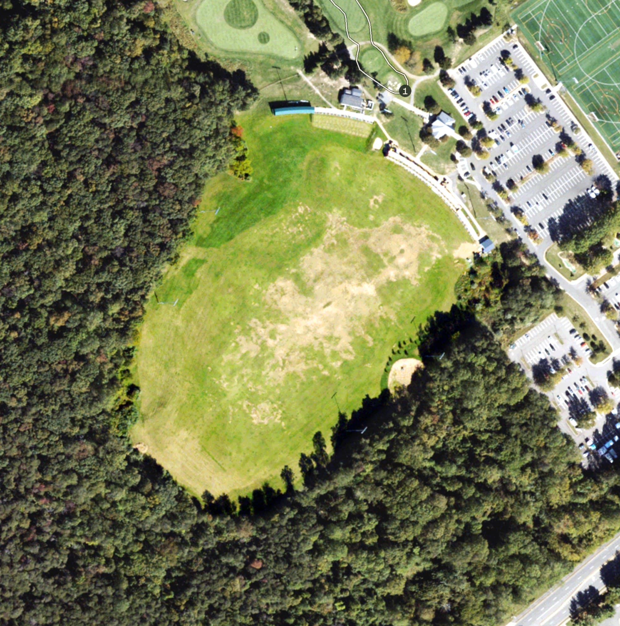 Aerial view of Oakmont Driving Range, VA, with its hole routing marked