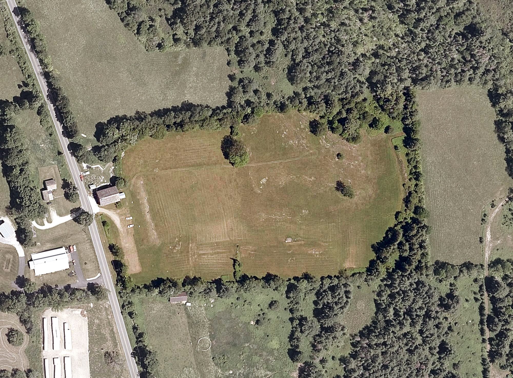 Aerial view of Airport Driving Range, VT, with its hole routing marked