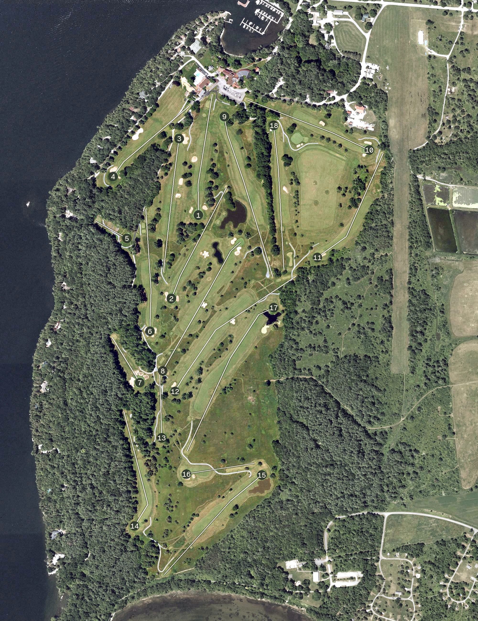 Aerial view of The Golf Club at Basin Harbor, VT, with its hole routing marked