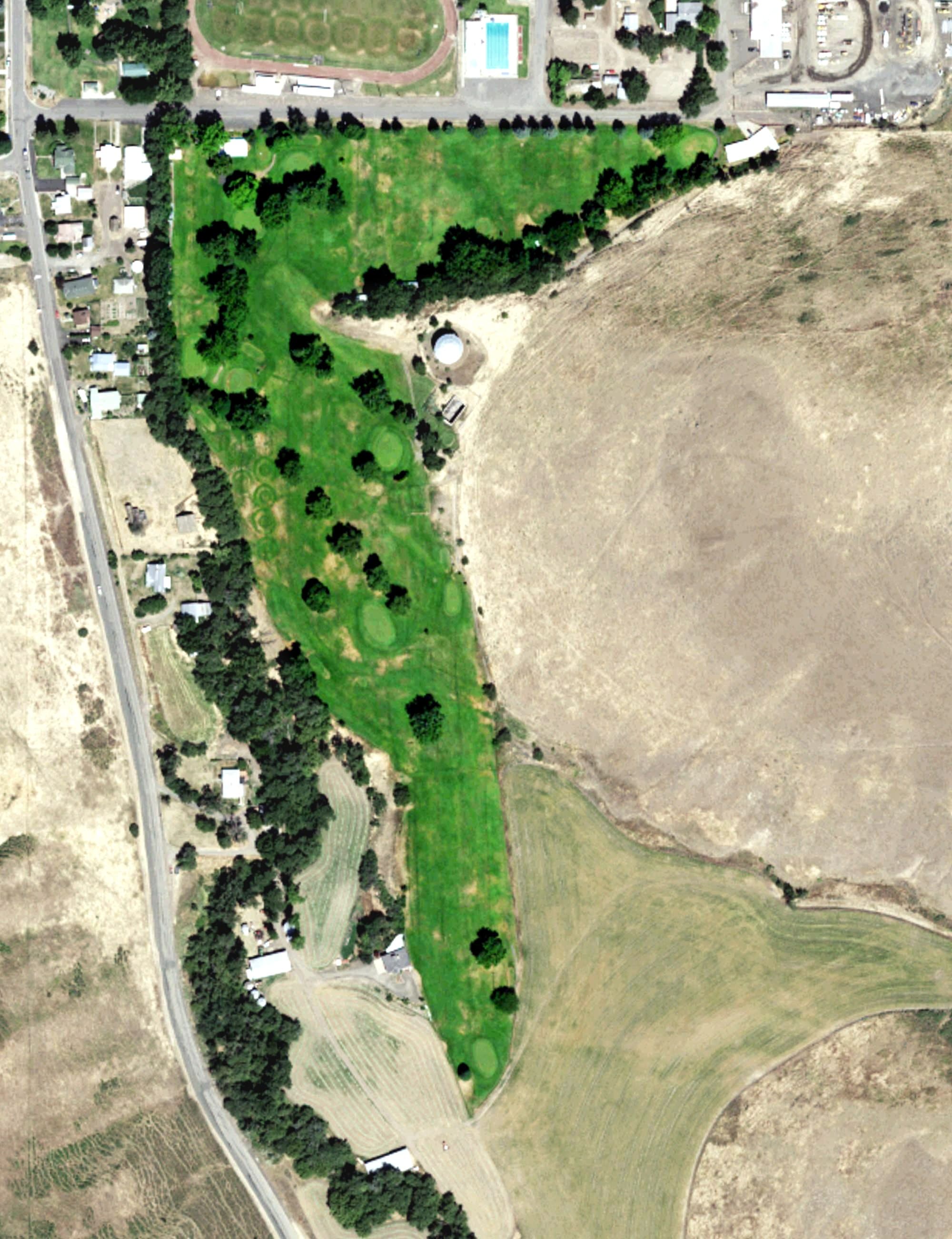 Aerial view of Crystal Springs Golf Course, WA, with its hole routing marked