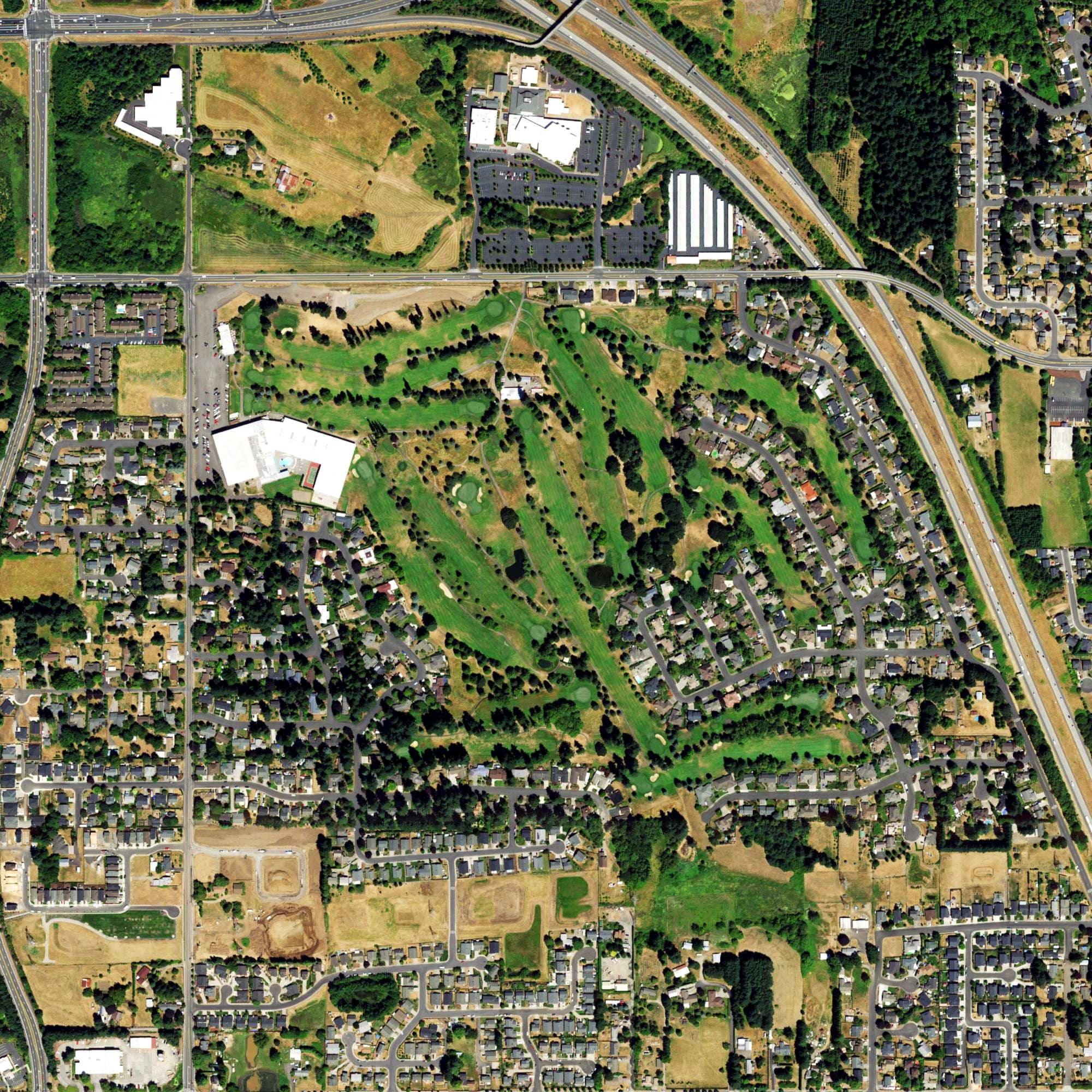 Aerial view of Green Meadows Golf Course, WA, with its hole routing marked