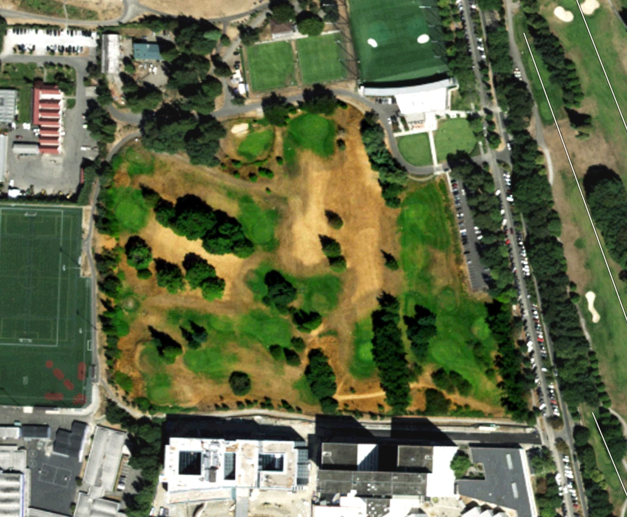 Aerial view of Jefferson Park Par 3 Course, WA, with its hole routing marked