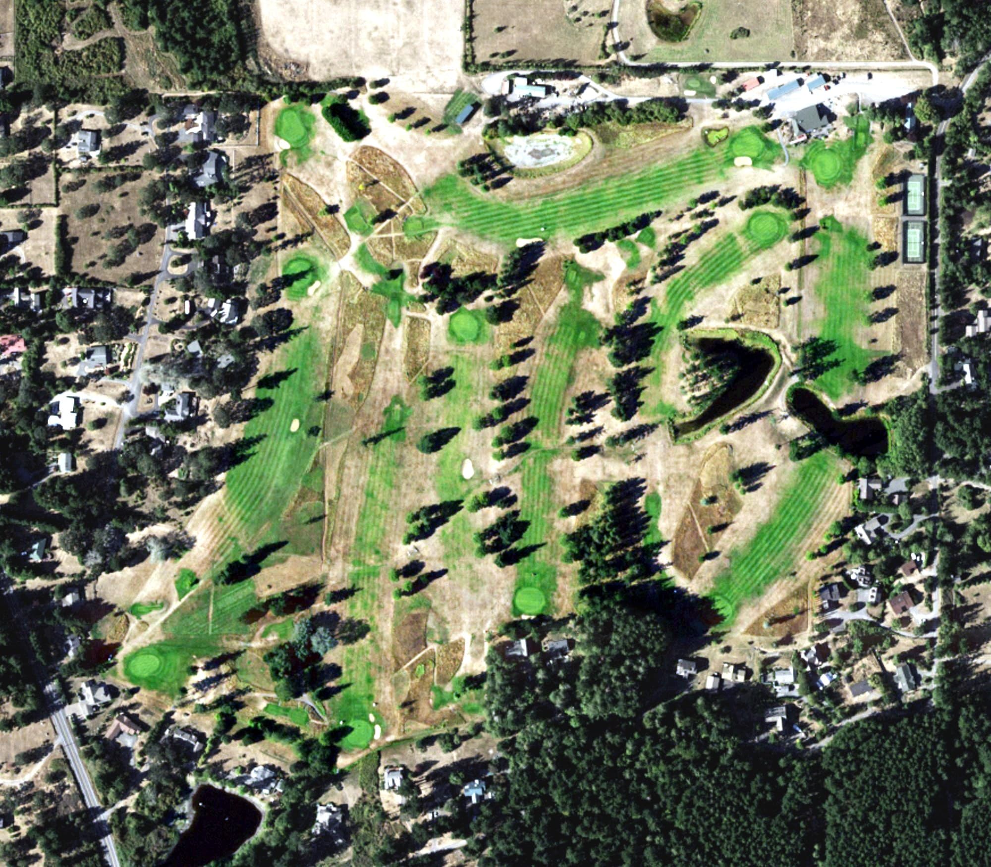 Aerial view of San Juan Golf & Tennis Club, WA, with its hole routing marked
