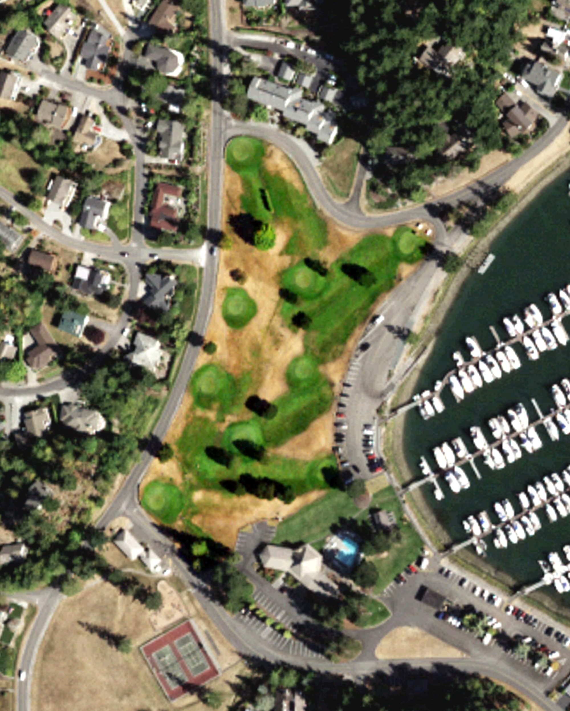 Aerial view of Shelter Bay Community Golf Course, WA, with its hole routing marked