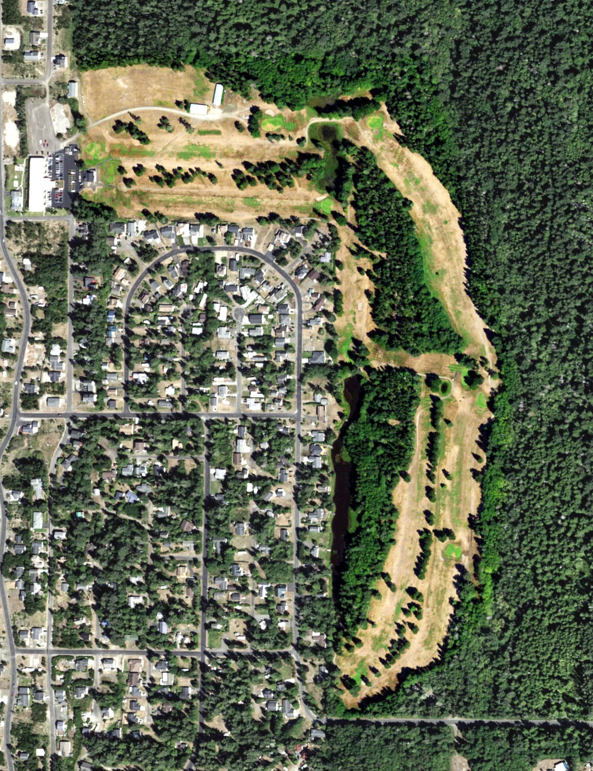 Aerial view of Surfside Golf Course, WA, with its hole routing marked