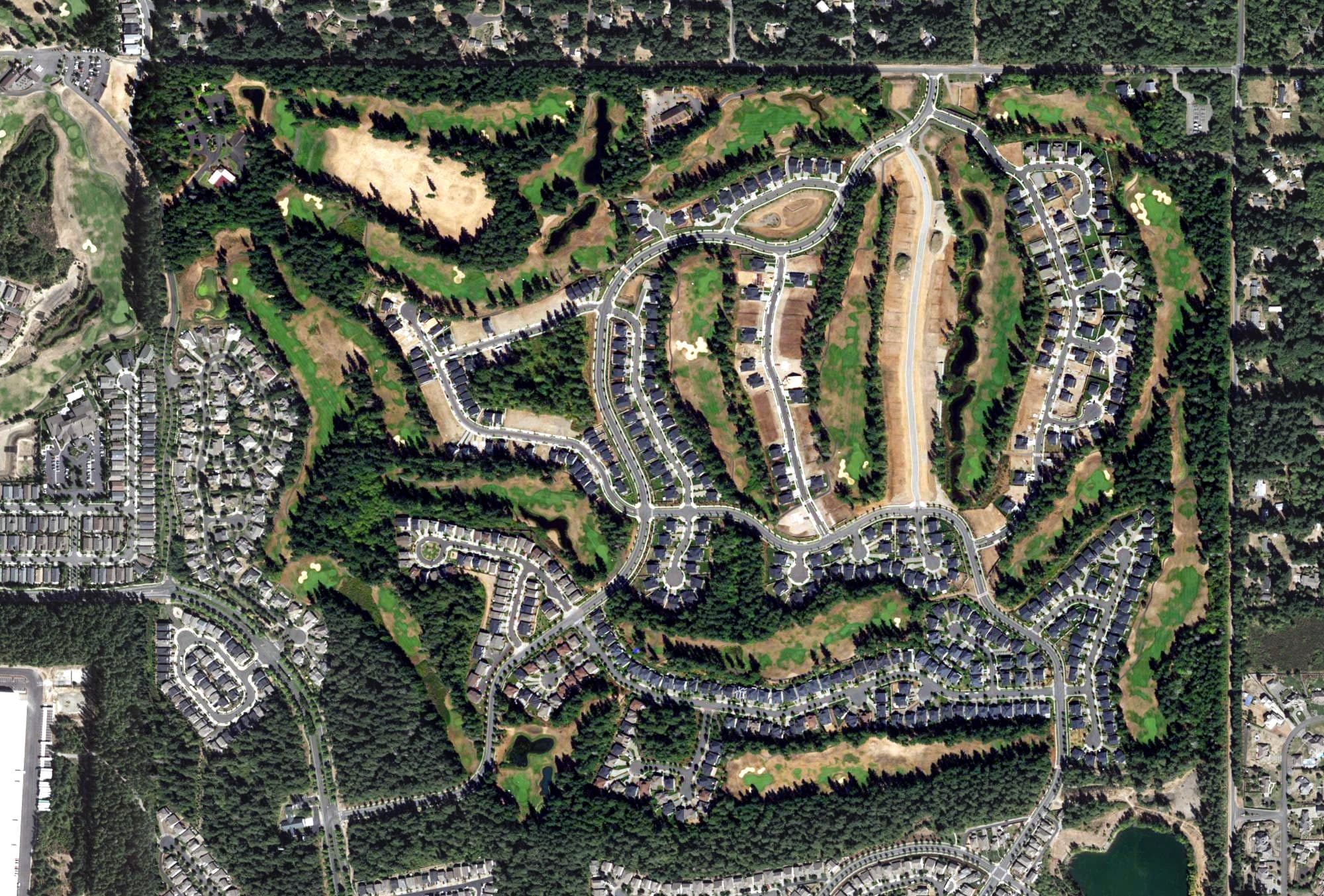 Aerial view of The Golf Club at Hawks Prairie - The Woodlands, WA, with its hole routing marked