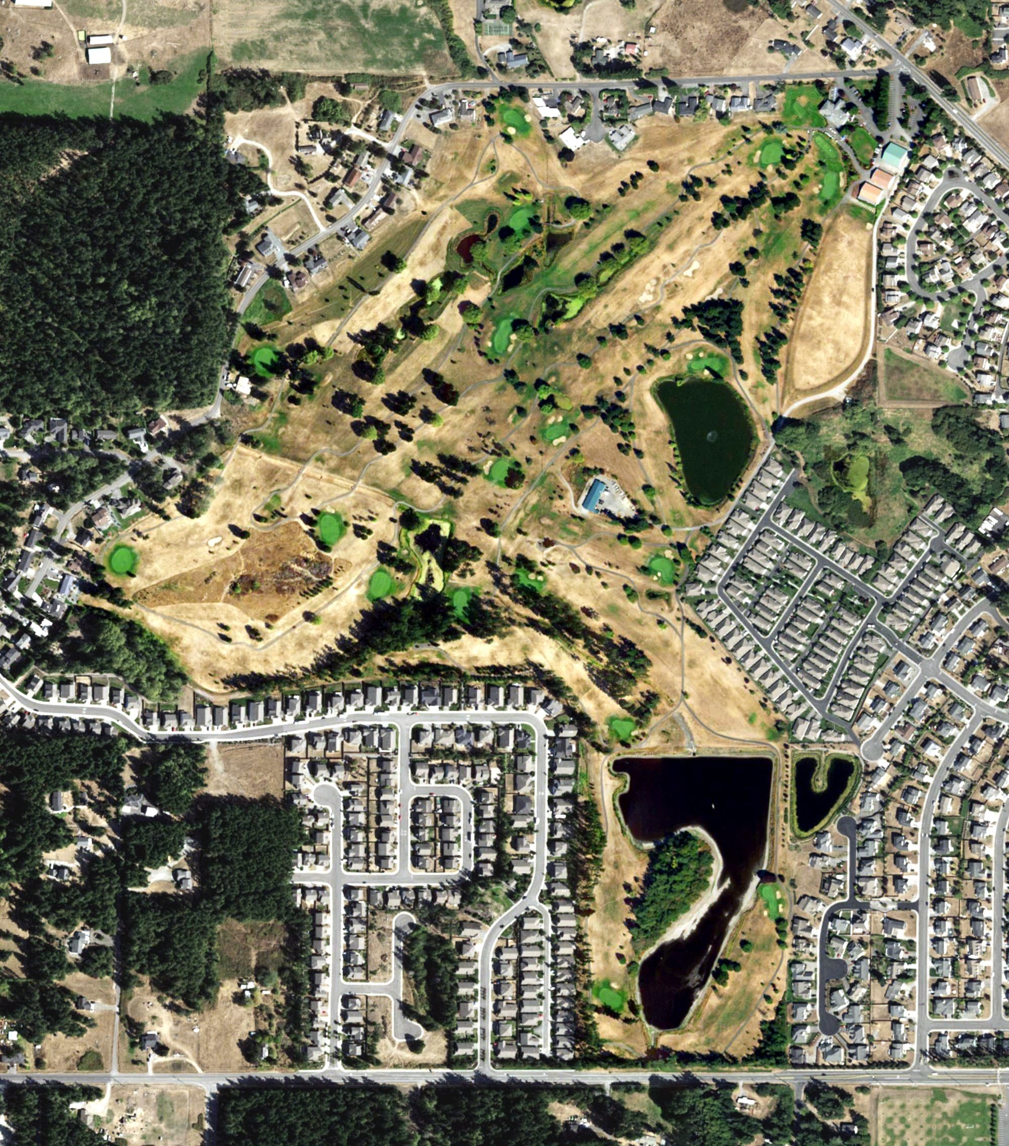 Aerial view of Whidbey Golf Club, WA, with its hole routing marked