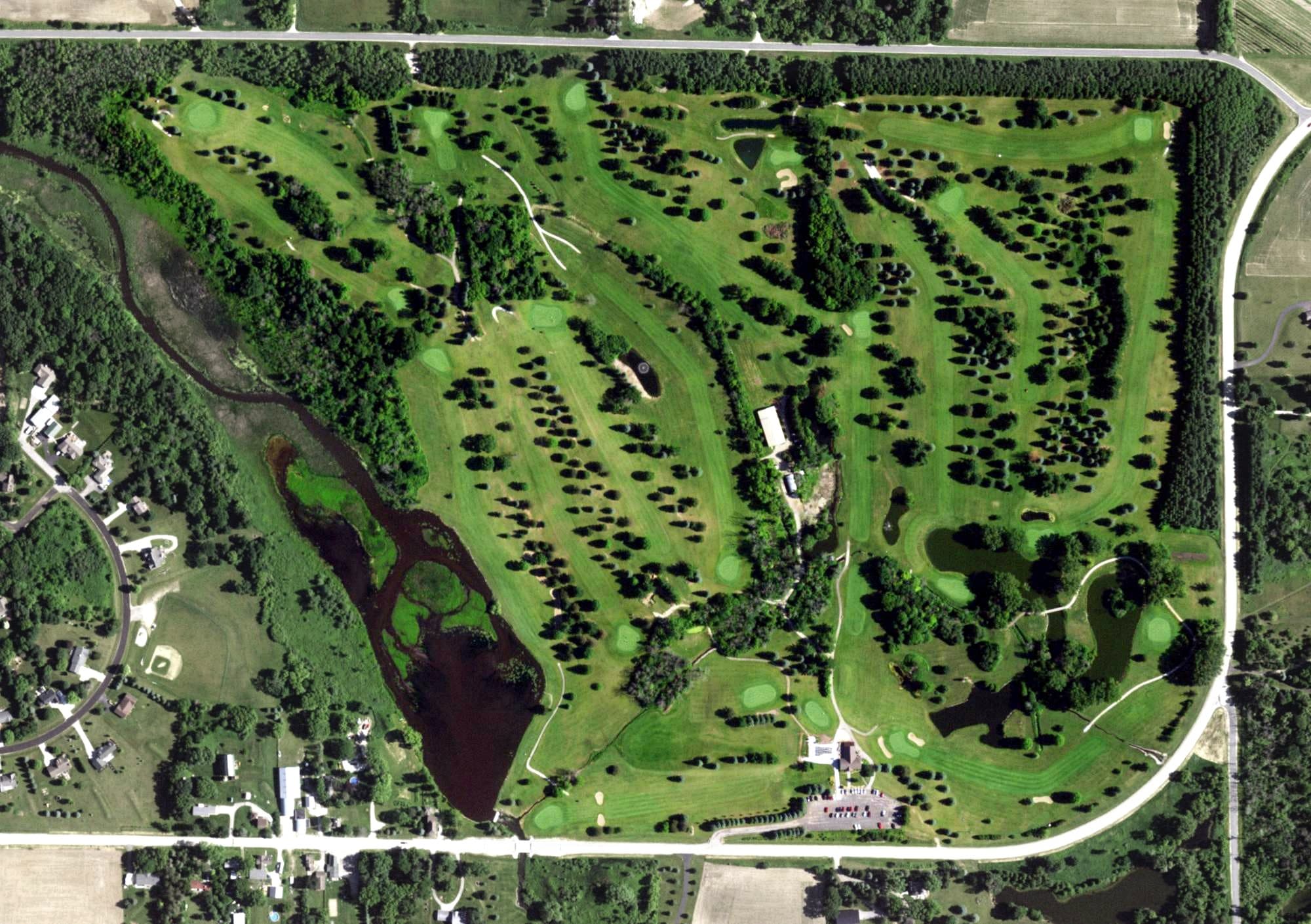 Aerial view of Deertrak Golf Club, WI, with its hole routing marked