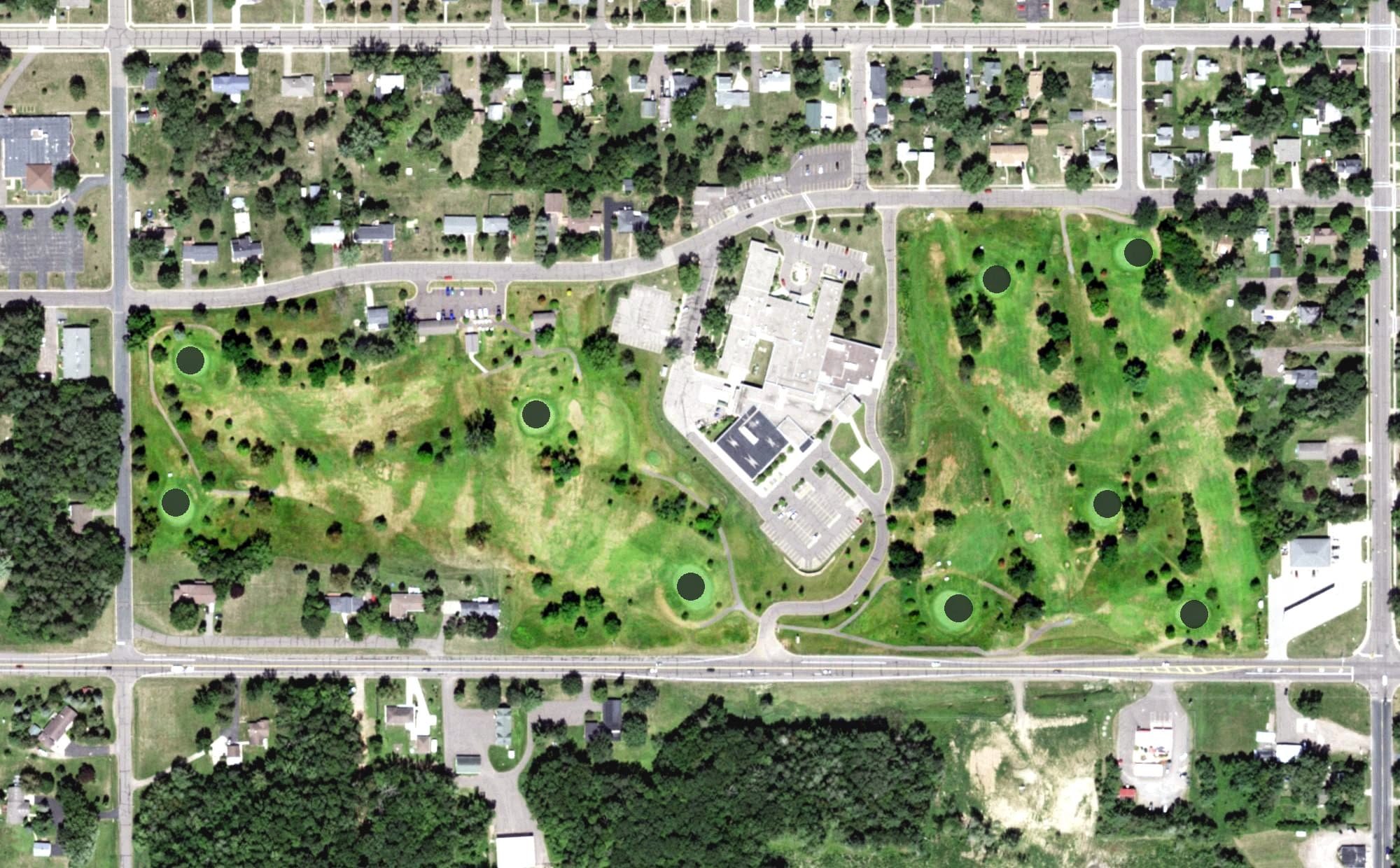 Aerial view of Grantsburg Golf Course, WI, with its hole routing marked