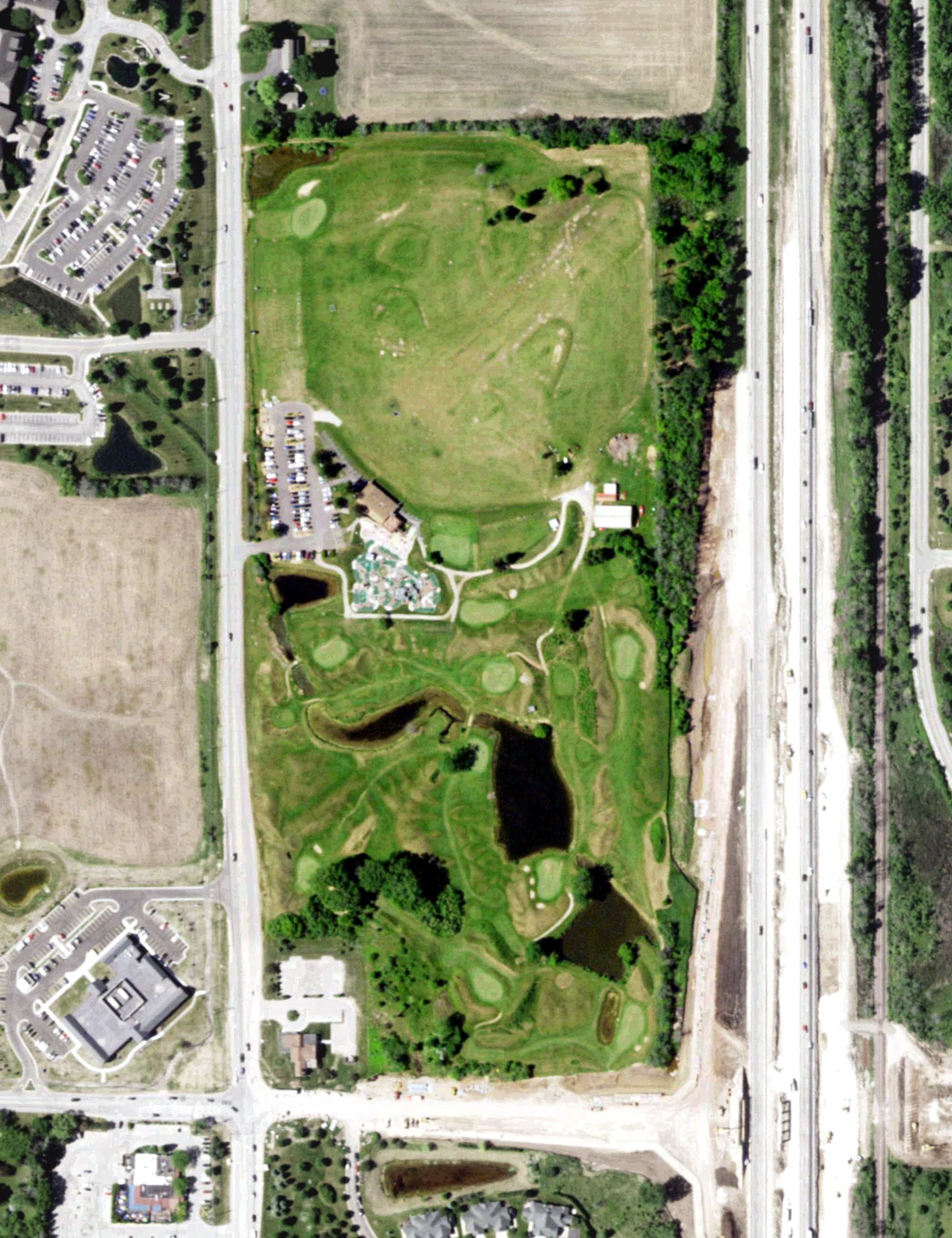Aerial view of Missing Links Golf Course, WI, with its hole routing marked
