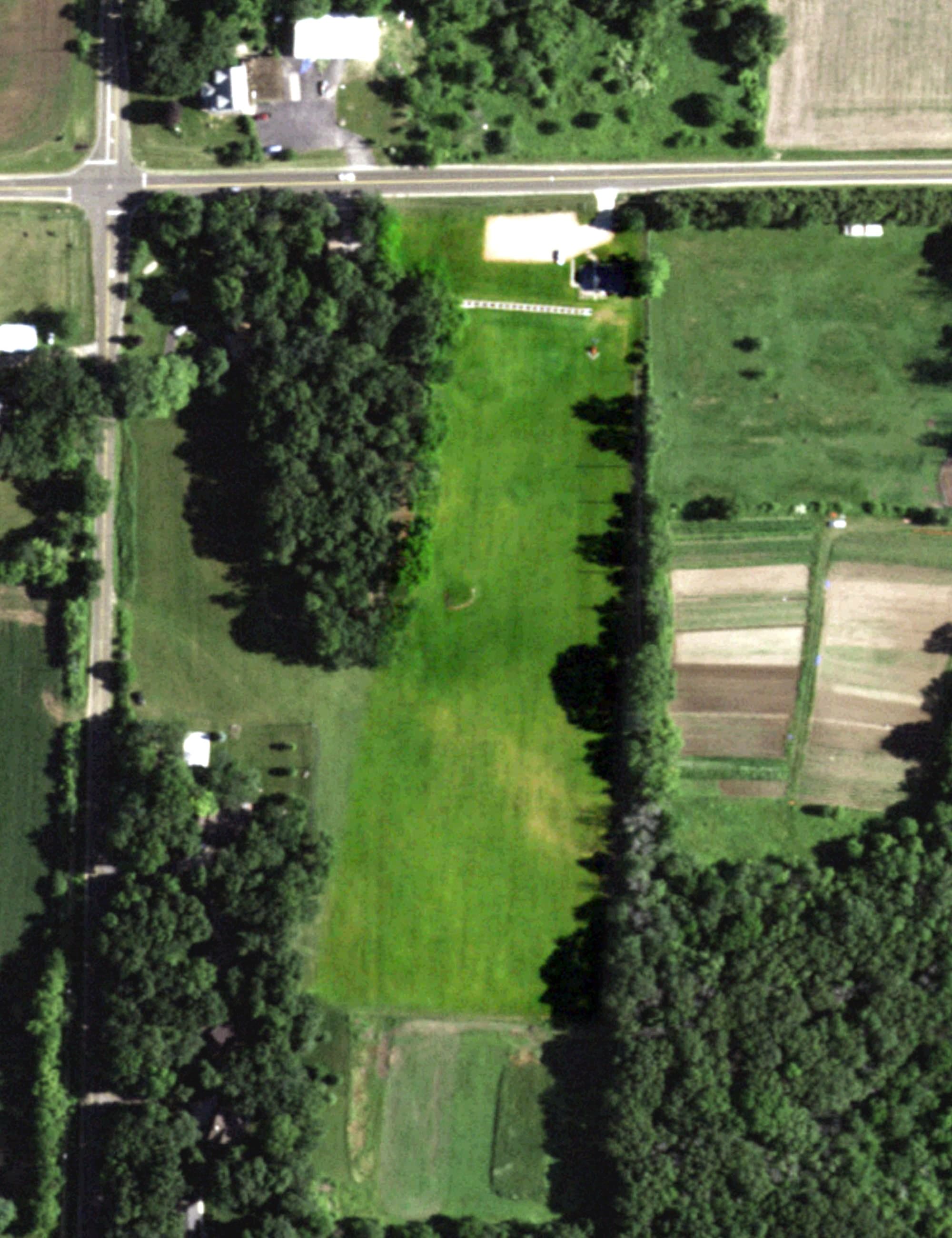 Aerial view of Pumpkin Hollow Driving Range, WI, with its hole routing marked